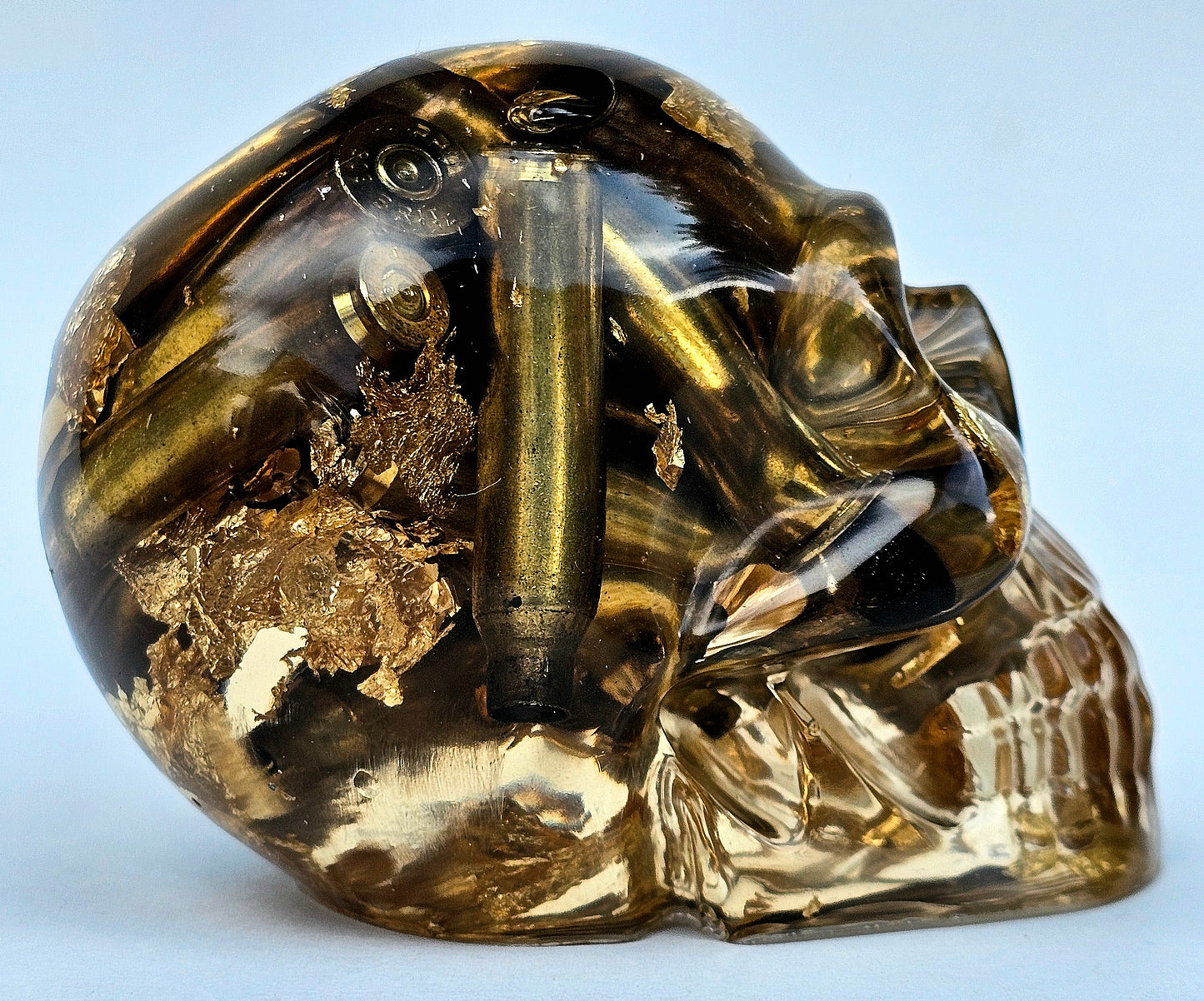 #0279 Handmade Resin Skull - Brass in clear resin with gold accents