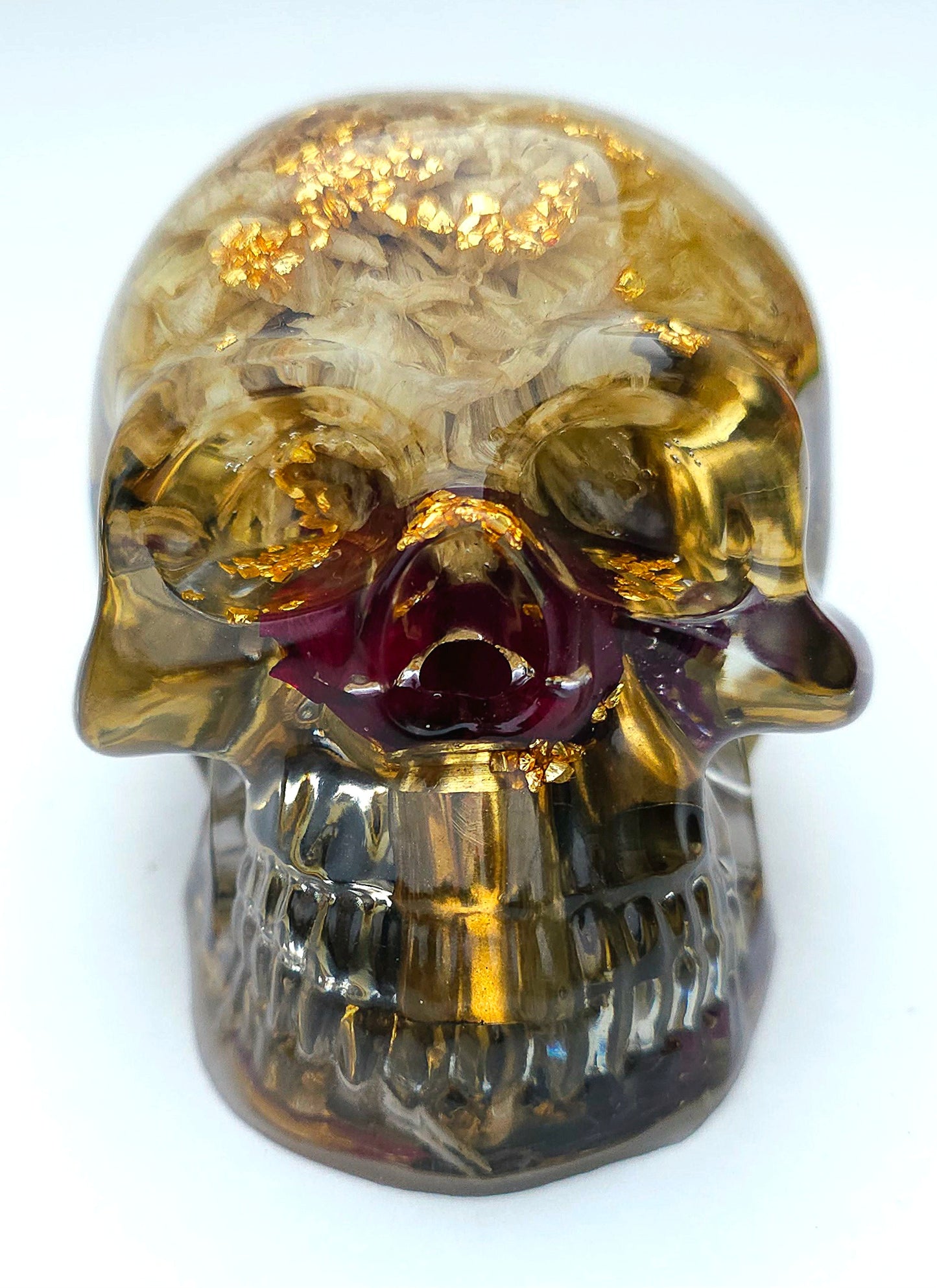 SOLD*Handmade Resin Skull- With wild dried Hydrangea flower mixture. We've also added spent brass shells to help ground the piece some contrast.