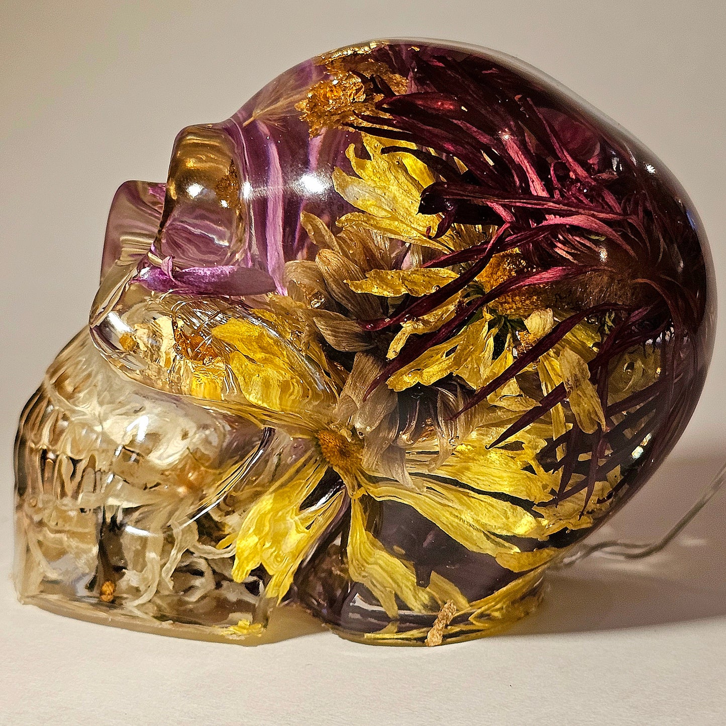 #0272 Handmade Resin Skull - Mixed flowers in clear resin. HAS LIGHTS. Battery operated.