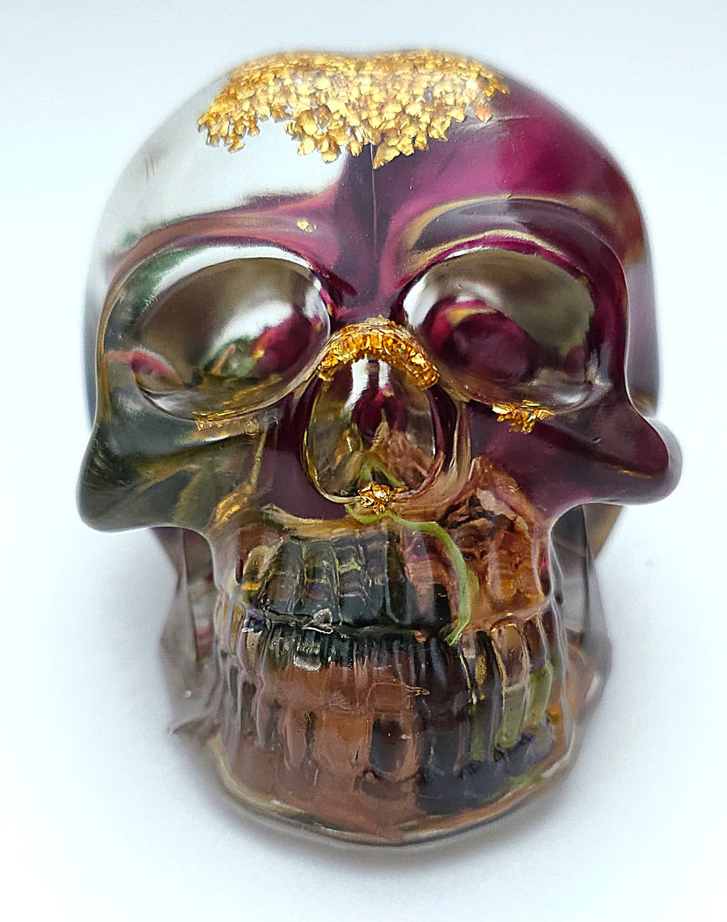 *SOLD*Handmade Resin Skull- Large wild Rose, with flower mixture. Discounted price. This piece came out quite cloudy.