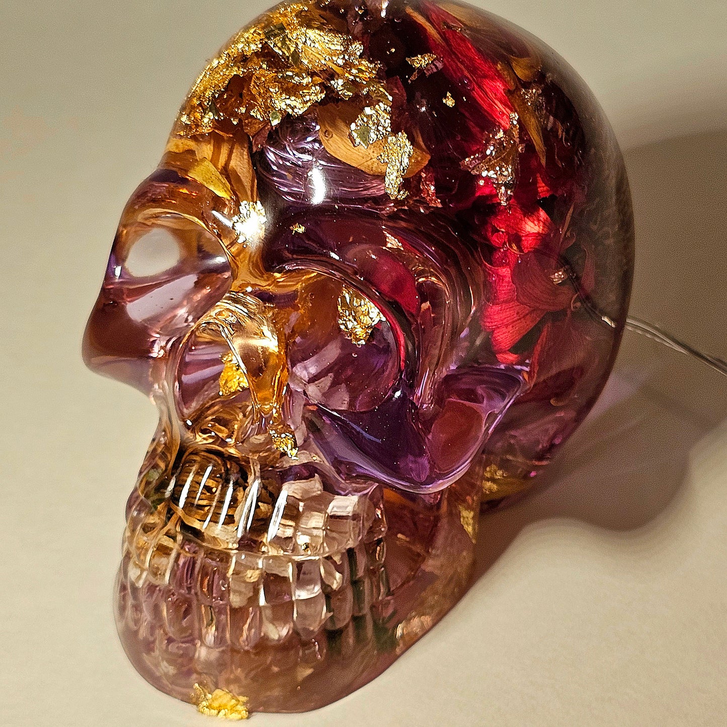 #0269 Handmade Resin Skull - Mixed flowers in clear resin. HAS LIGHTS. Battery operated.