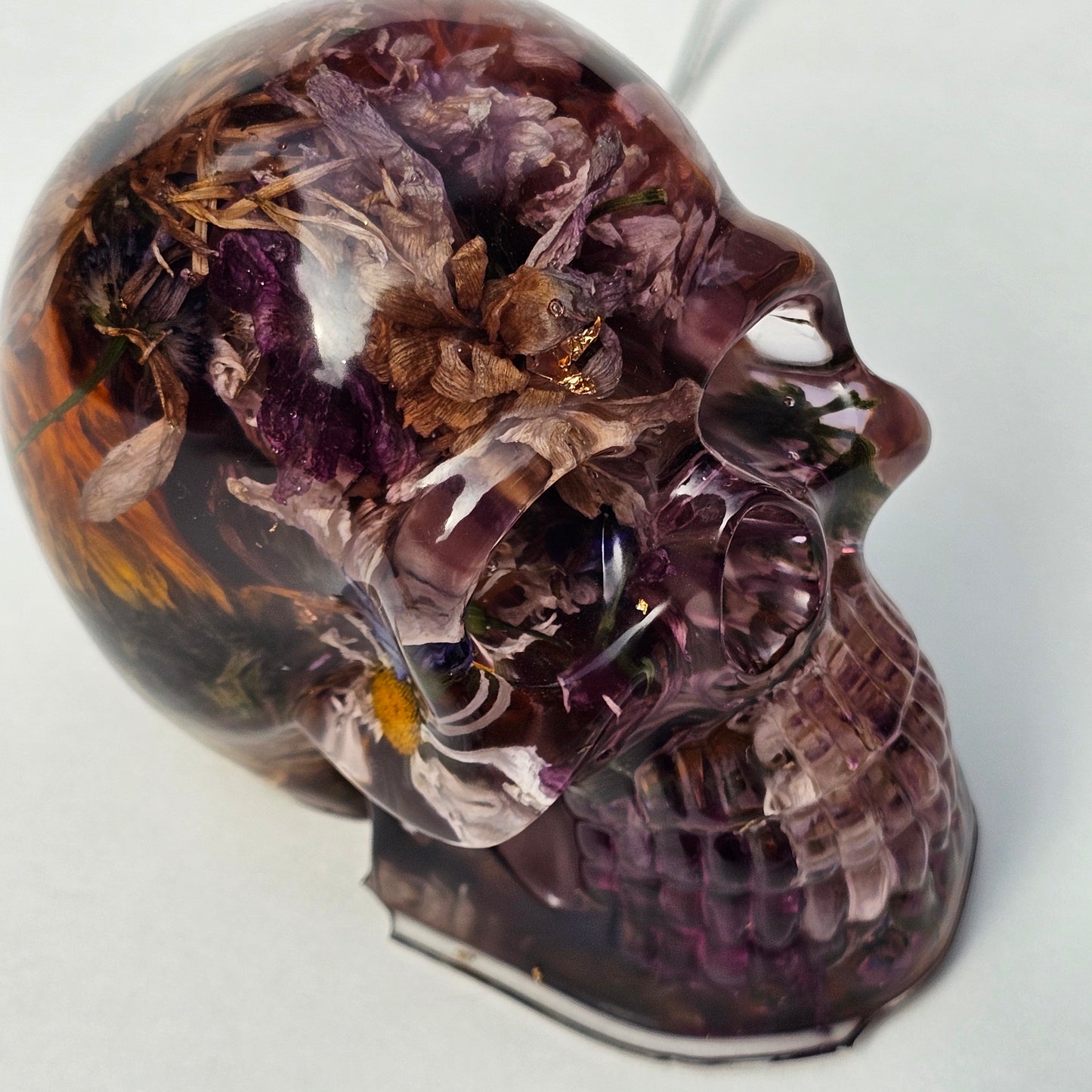 #0294 - Handmade Resin Skull - Autumn flower blend in light purple resin. This one lights up! HAS LIGHTS!