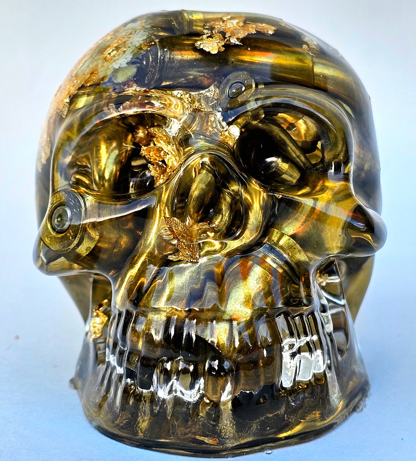 SOLD #0055 Handmade Resin Skull - Various shell casings gold accents