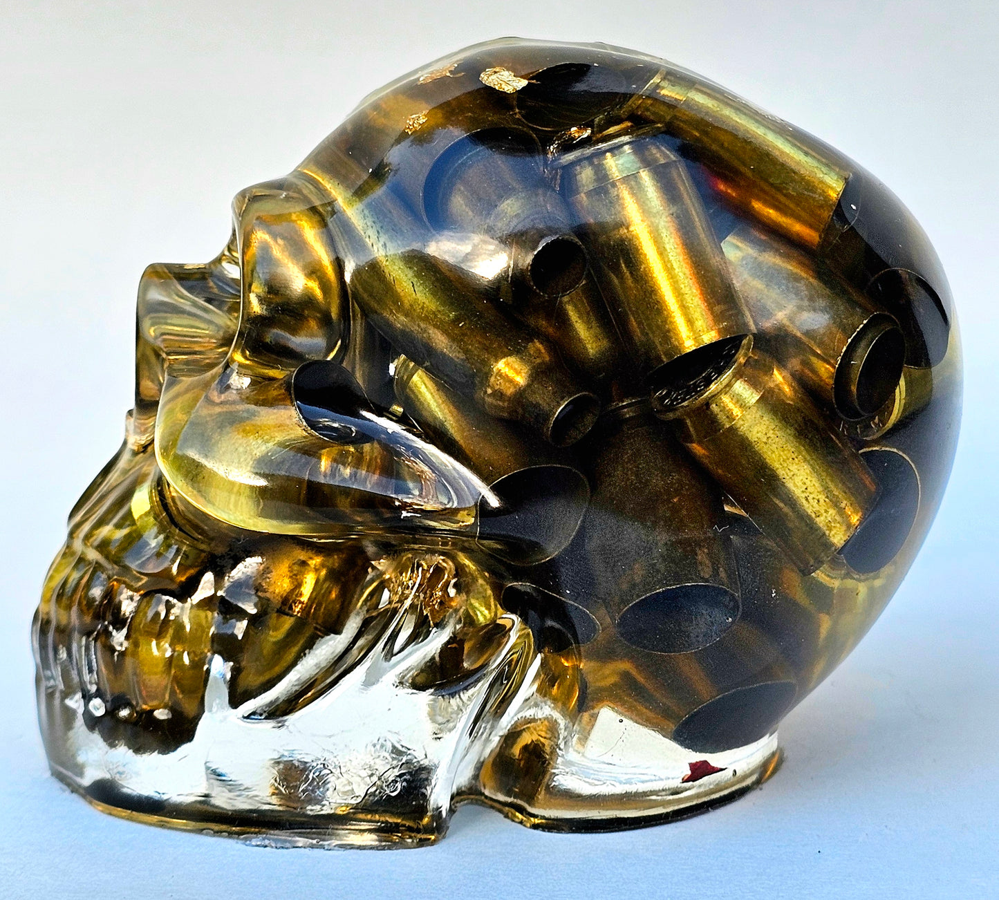 SOLD #0055 Handmade Resin Skull - Various shell casings gold accents