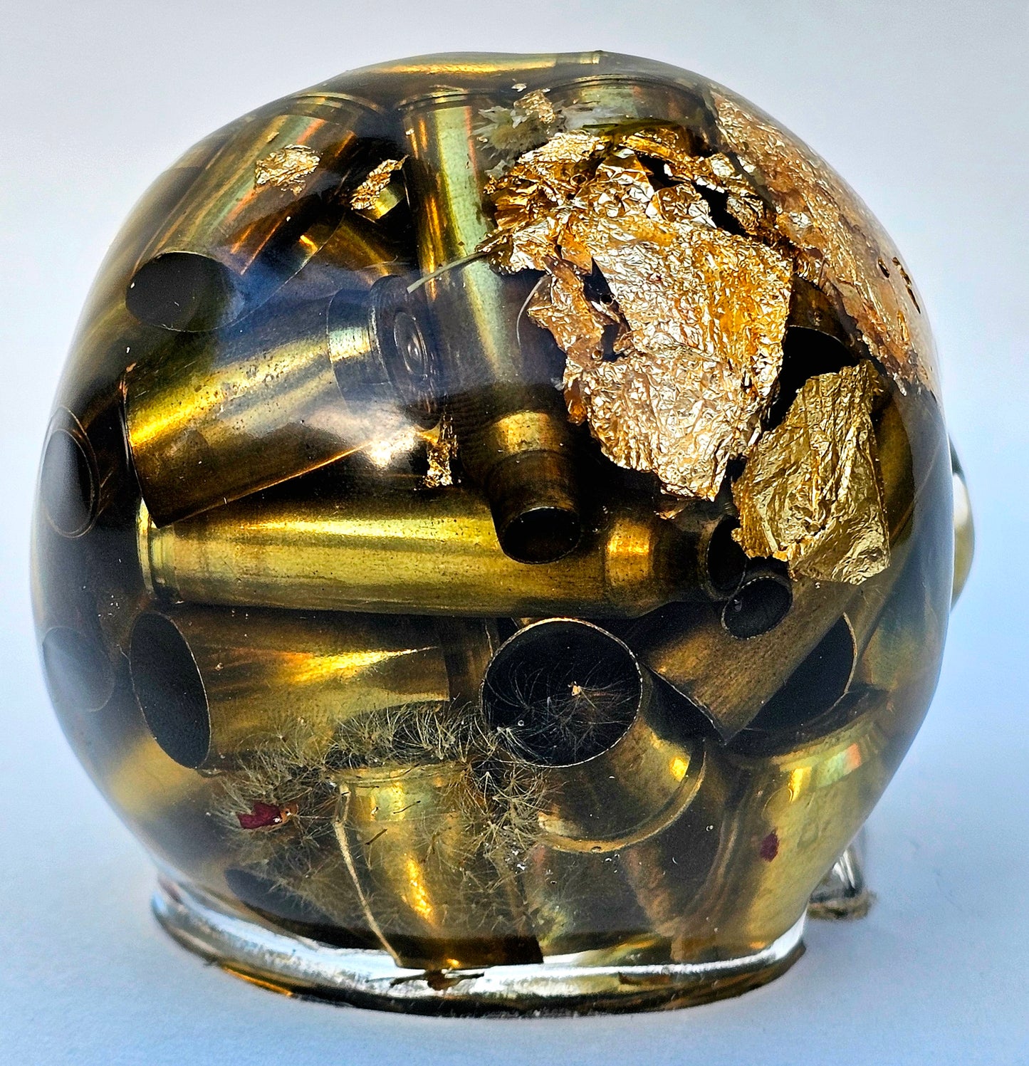 SOLD #0055 Handmade Resin Skull - Various shell casings gold accents