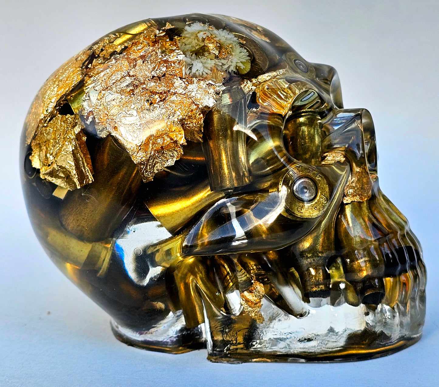 SOLD #0055 Handmade Resin Skull - Various shell casings gold accents