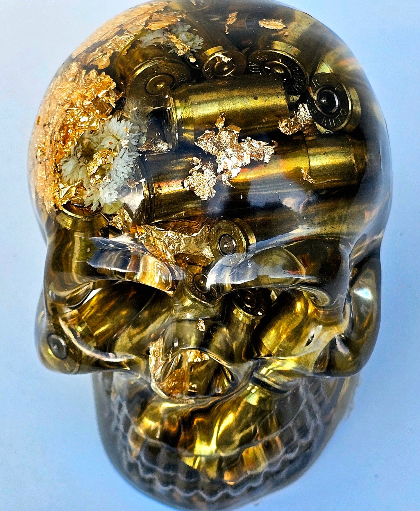 SOLD #0055 Handmade Resin Skull - Various shell casings gold accents
