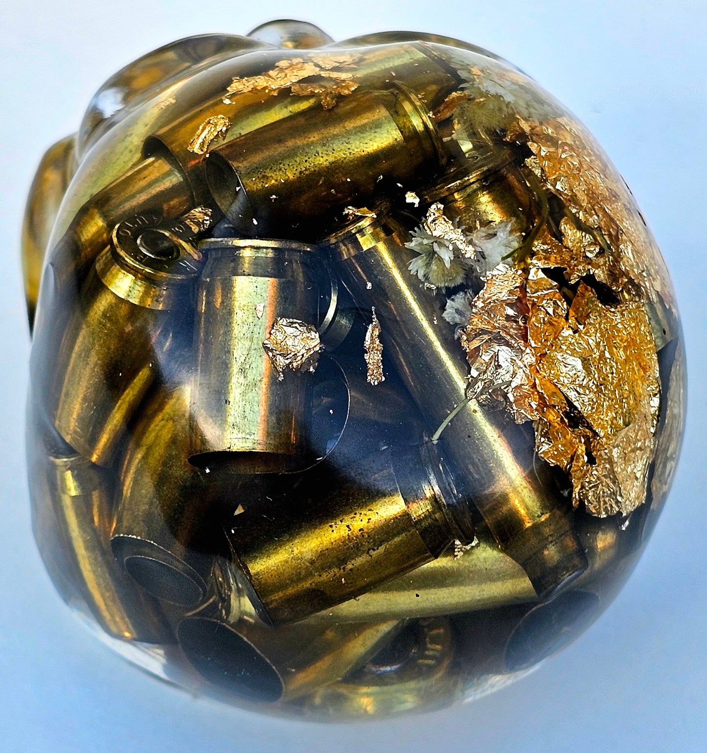SOLD #0055 Handmade Resin Skull - Various shell casings gold accents