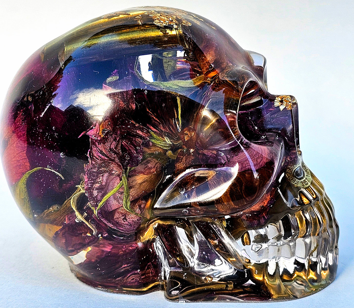 SOLD Handmade Resin Skull -  Large roses, and flowers shell casings in hand poured resin.
