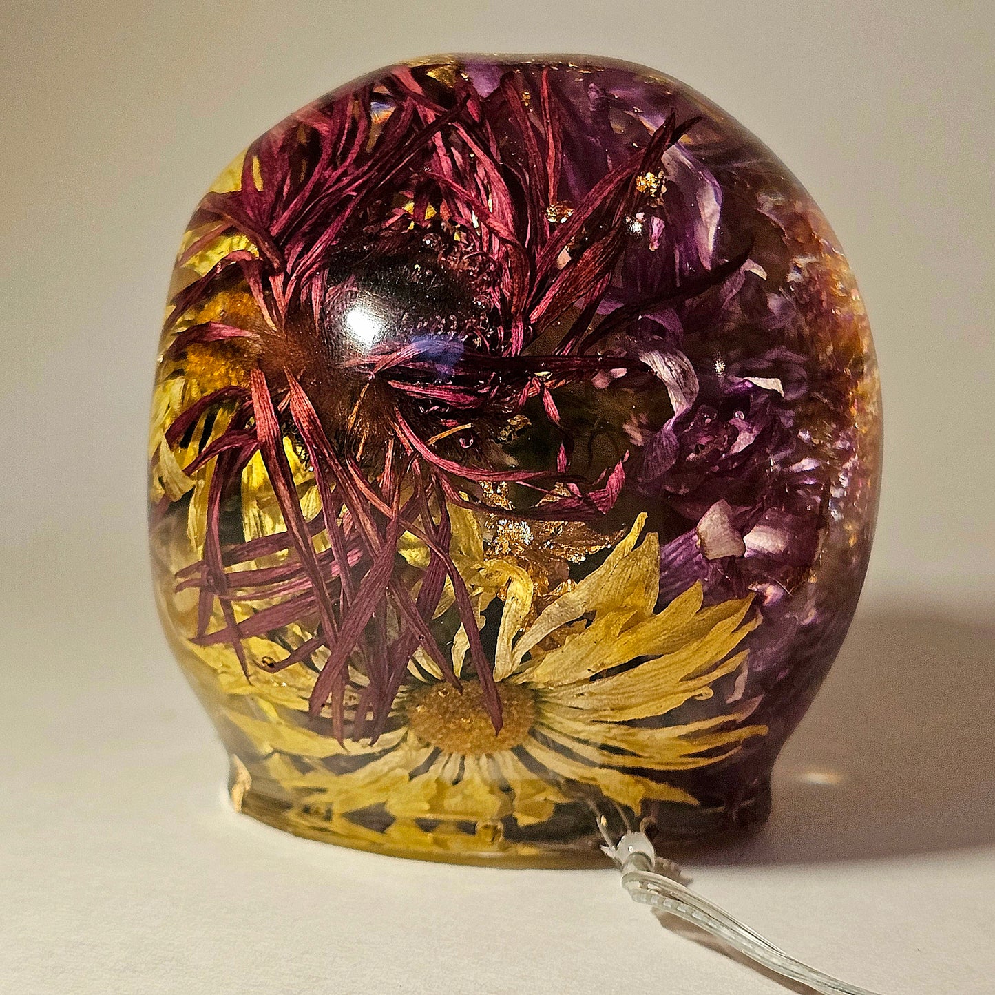 #0272 Handmade Resin Skull - Mixed flowers in clear resin. HAS LIGHTS. Battery operated.