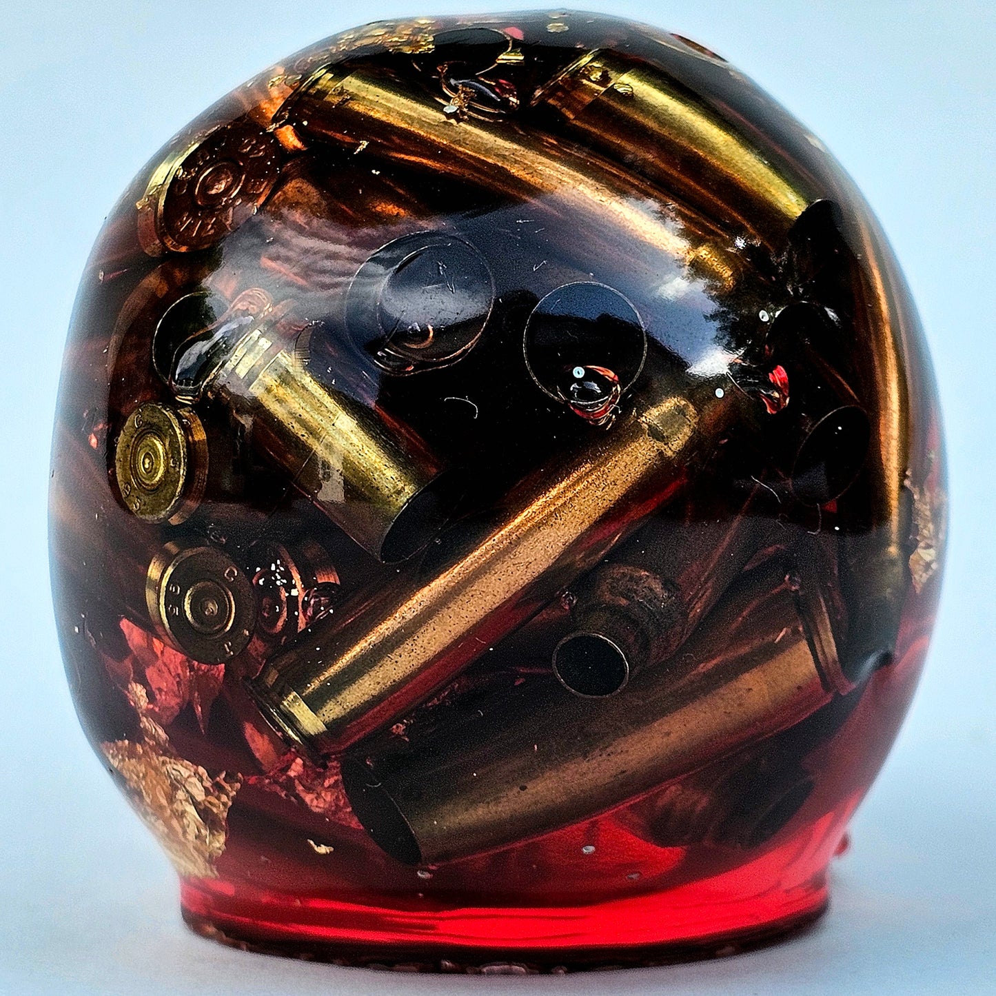 #0278 Handmade Resin Skull - Brass in red resin with gold accents