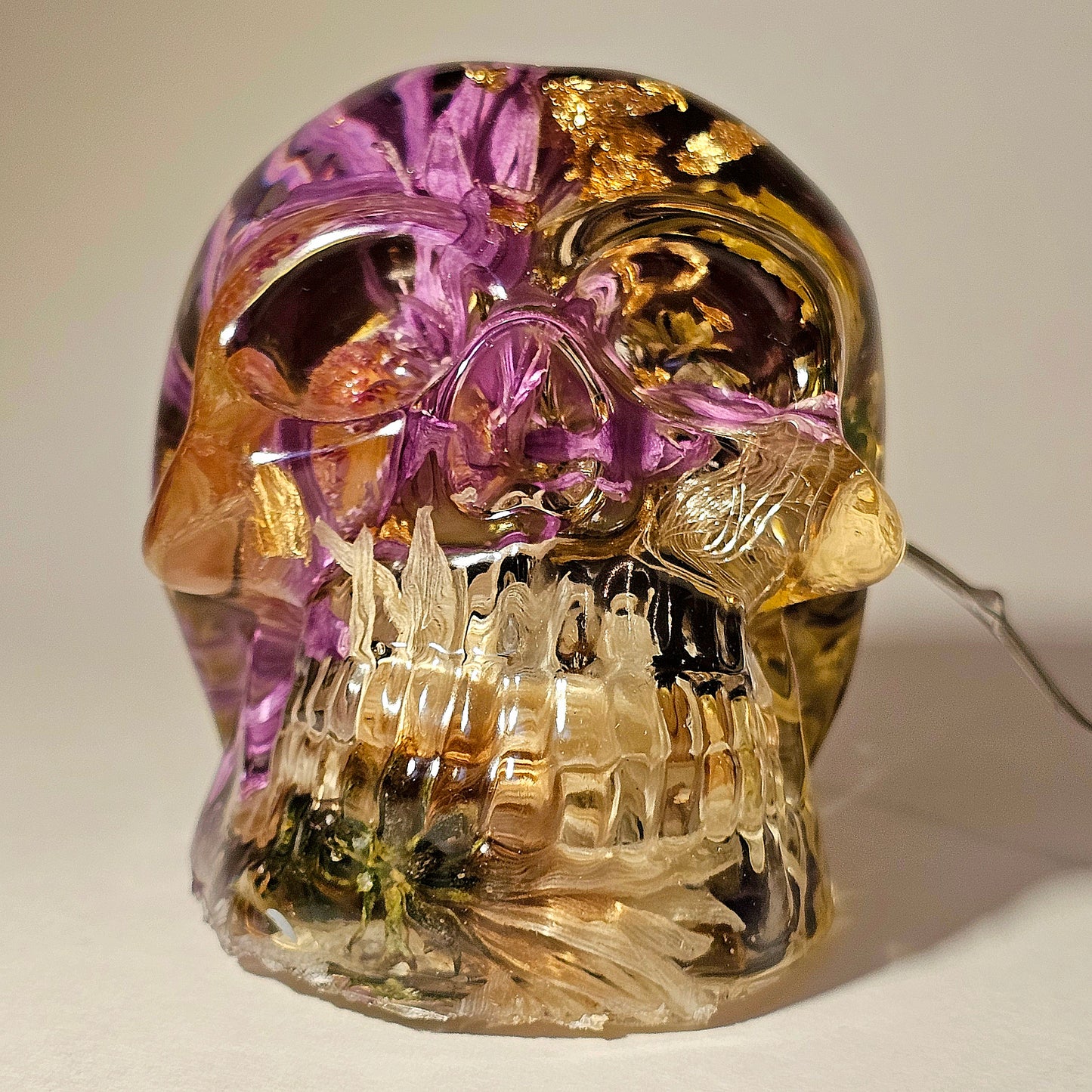 #0272 Handmade Resin Skull - Mixed flowers in clear resin. HAS LIGHTS. Battery operated.