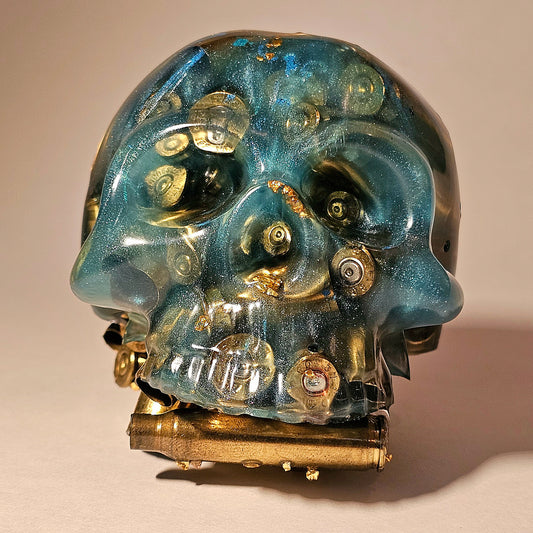 #0259 Handmade Resin Skull - Mixed brass in silver pigmen/blue resin. One of a kind for sure.
