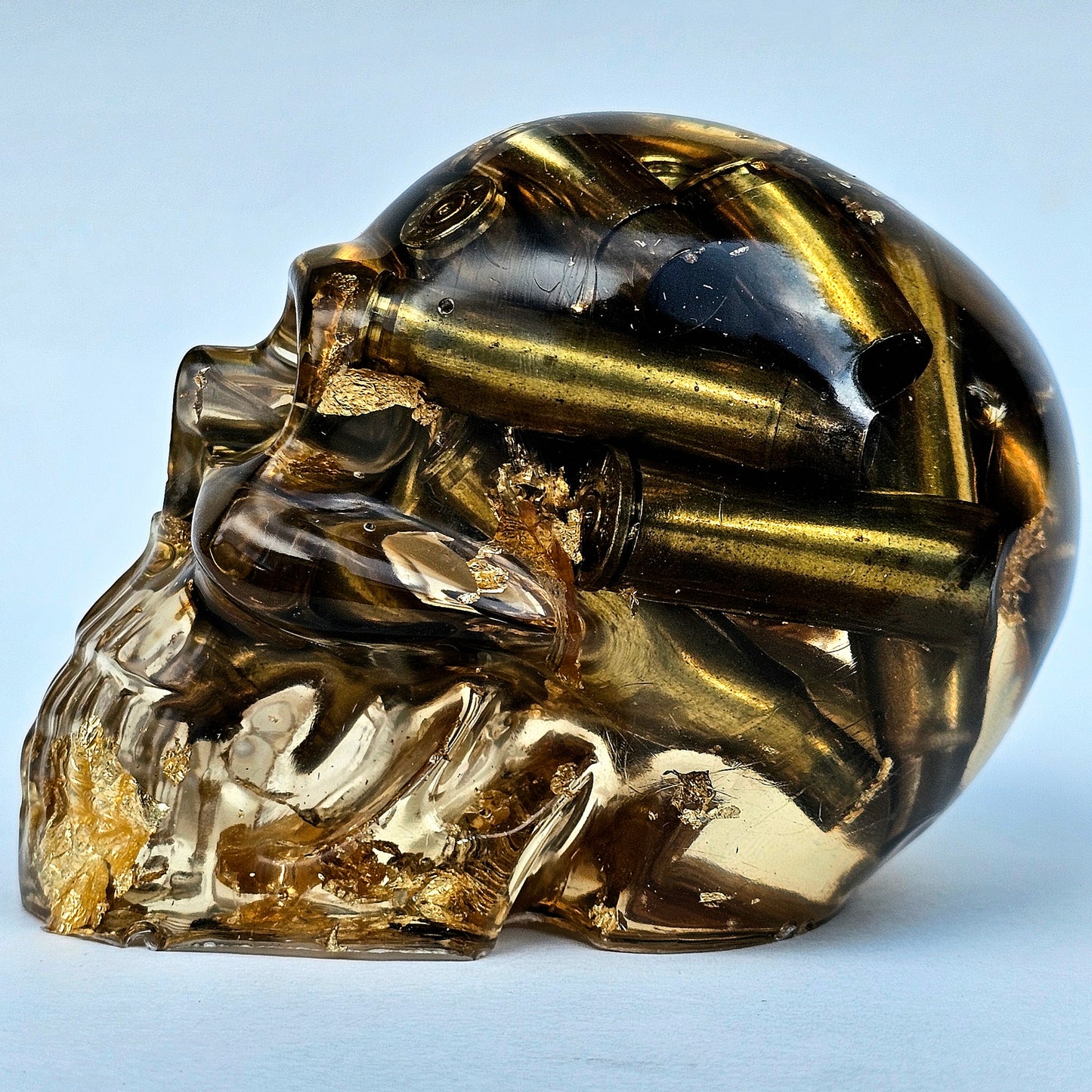 #0279 Handmade Resin Skull - Brass in clear resin with gold accents