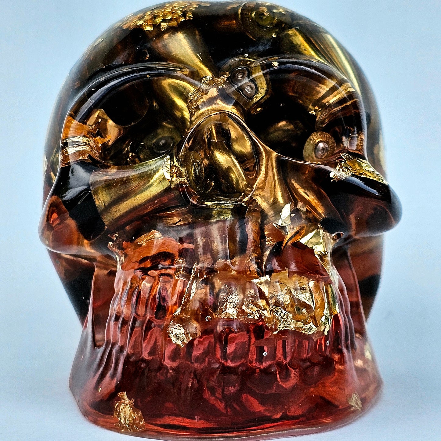 SOLD #0277 Handmade Resin Skull - Brass in red resin with gold accents