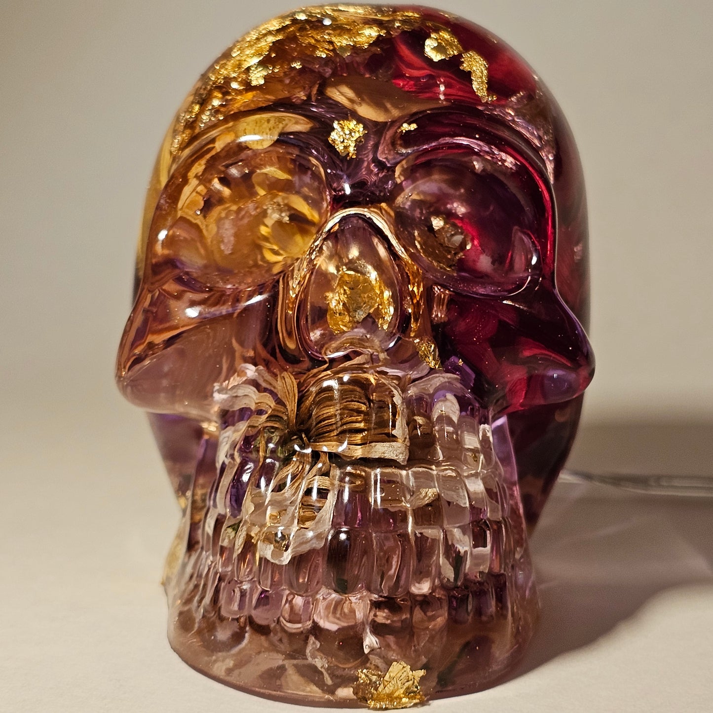 #0269 Handmade Resin Skull - Mixed flowers in clear resin. HAS LIGHTS. Battery operated.