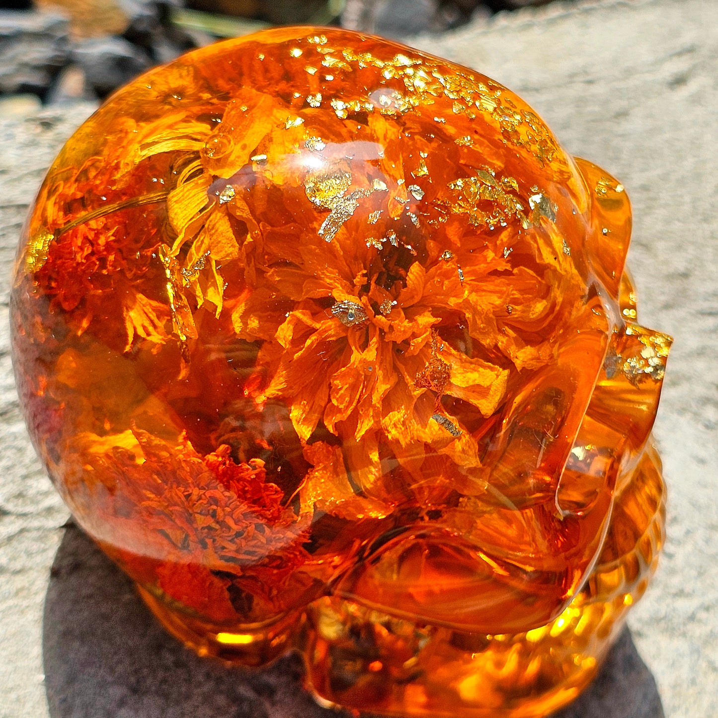 #0281 Handmade Resin Skull - Sunflowers and Marigolds in a warm orange resin.