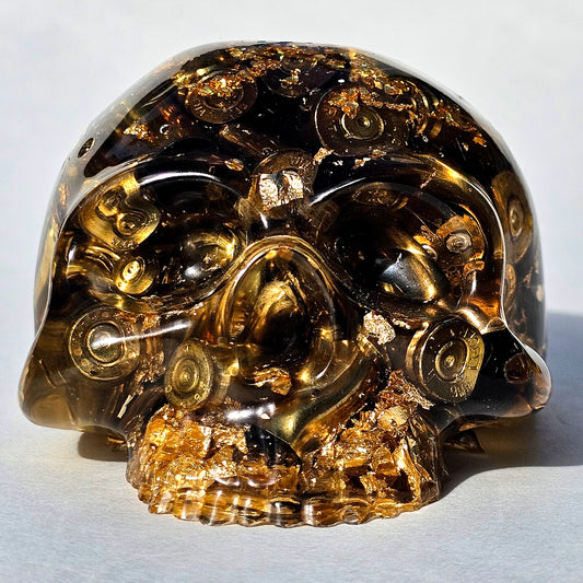 SOLD #0288 - Handmade Resin Skull -    We call it the "Halfer". Fun piece, in clear resin with brass hanging out the bottom. Gold accents.