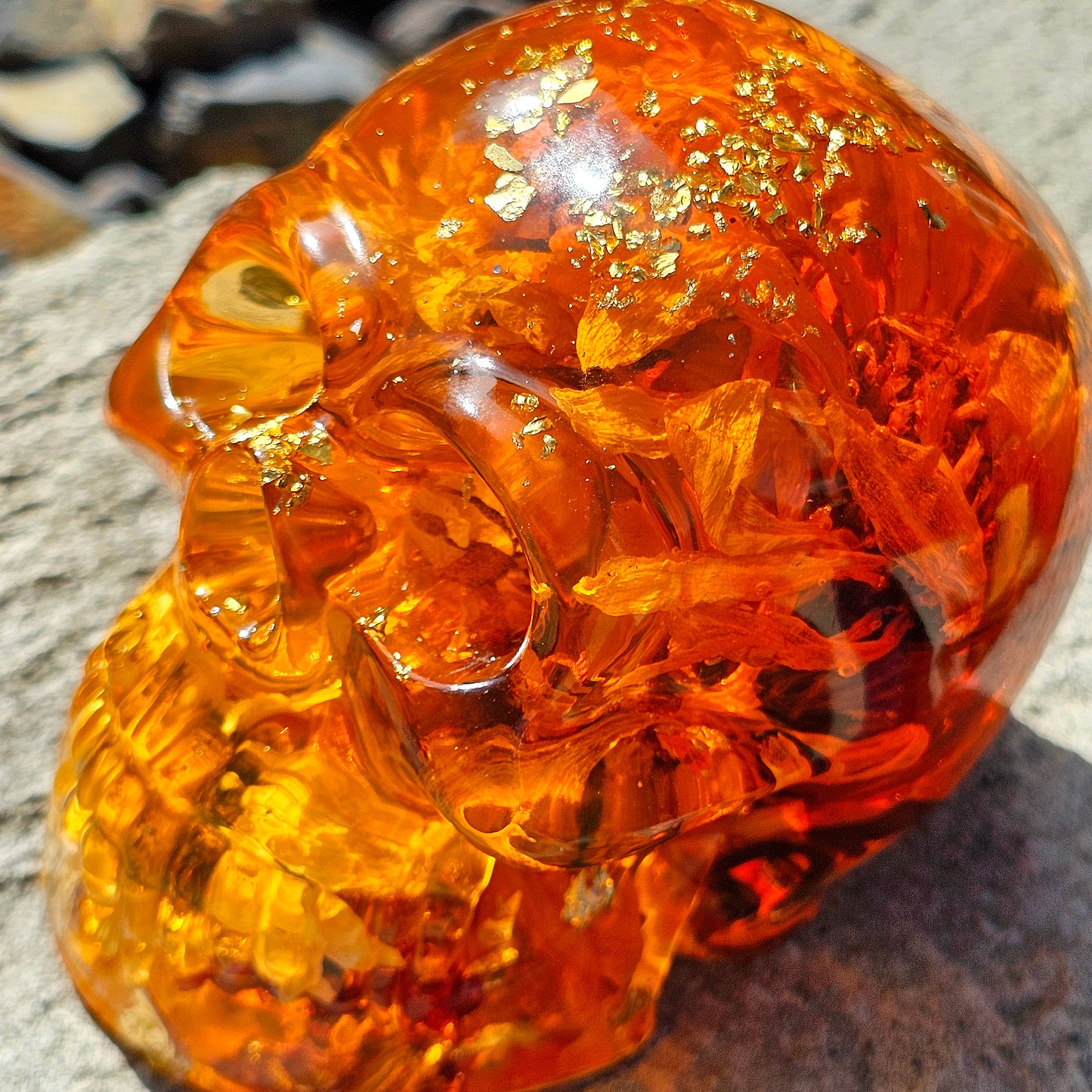 #0281 Handmade Resin Skull - Sunflowers and Marigolds in a warm orange resin.