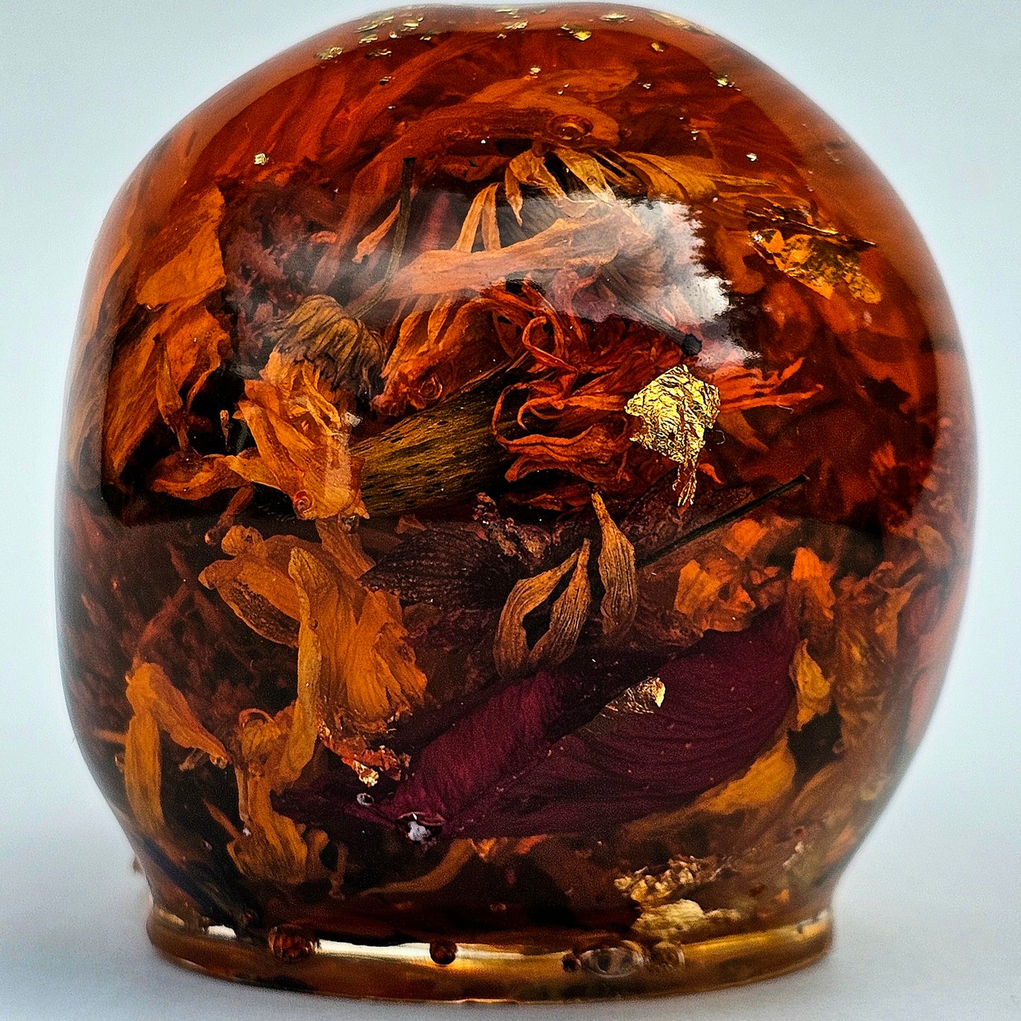 #0281 Handmade Resin Skull - Sunflowers and Marigolds in a warm orange resin.
