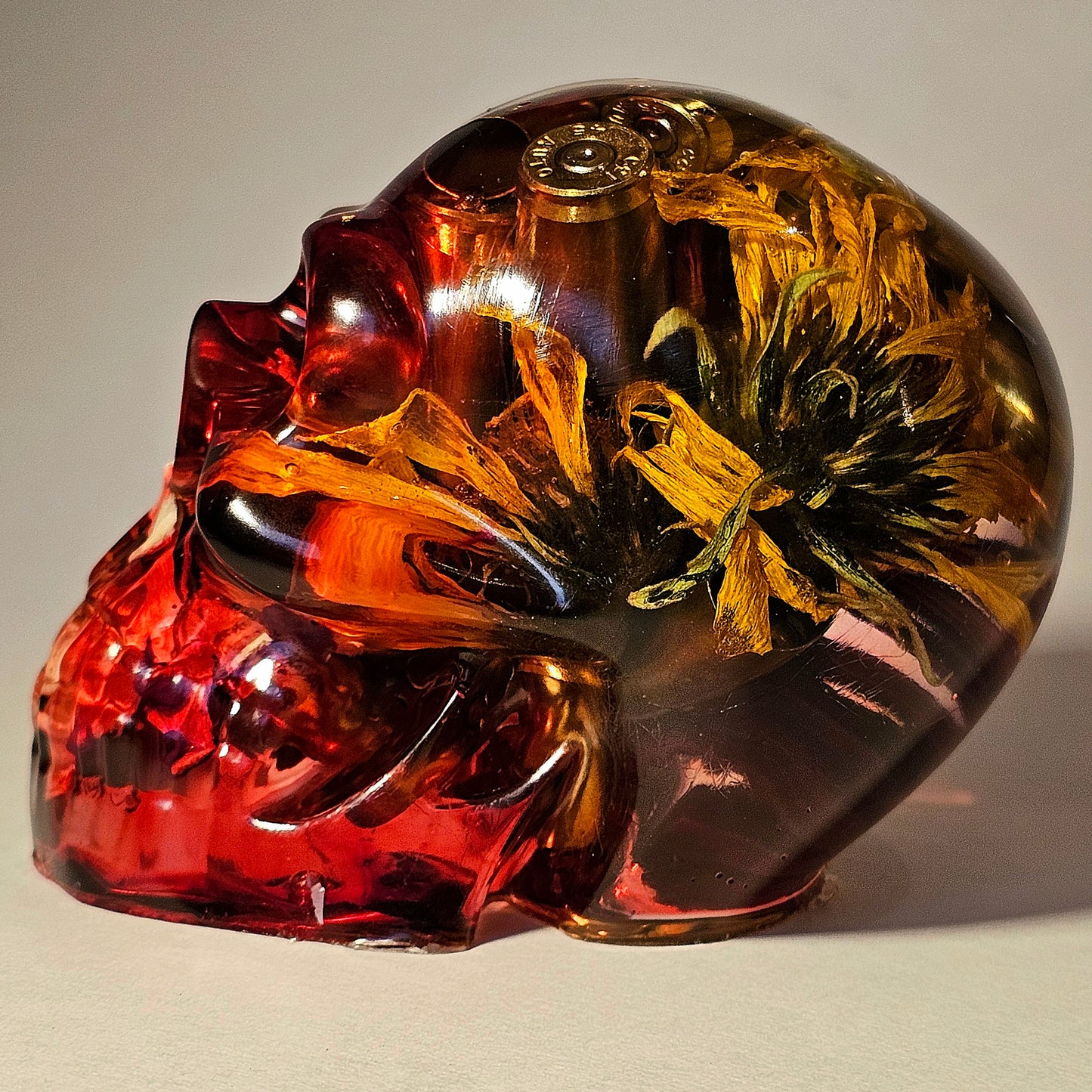 SOLD #0253 Handmade Resin Skull - Mixed wild flowers and brass in dripped red resin