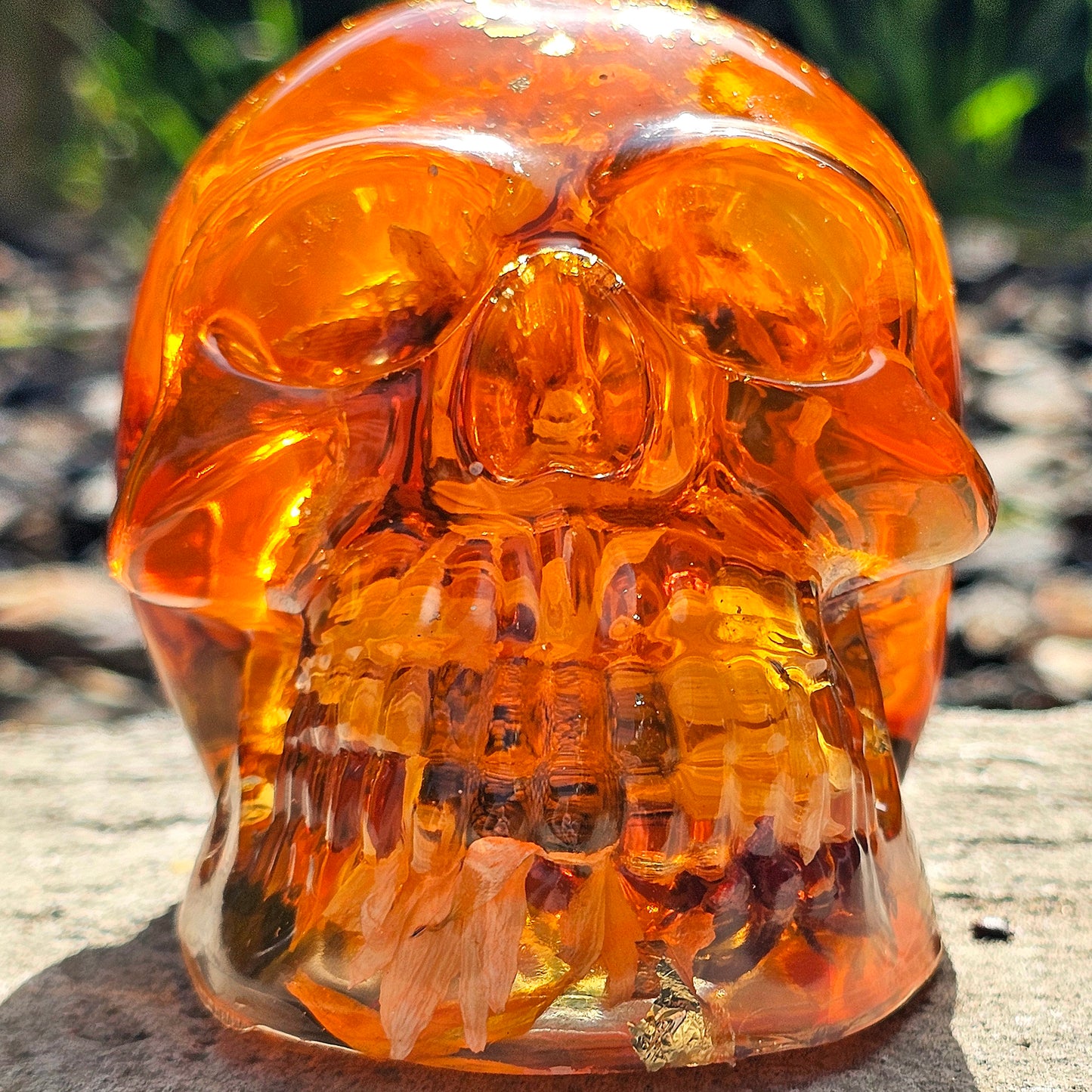 #0281 Handmade Resin Skull - Sunflowers and Marigolds in a warm orange resin.