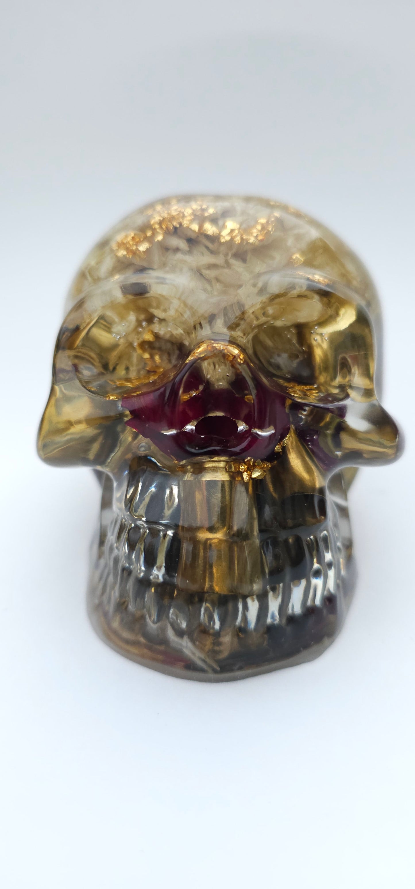 SOLD*Handmade Resin Skull- With wild dried Hydrangea flower mixture.  We've also added spent brass shells to help ground the piece some contrast.