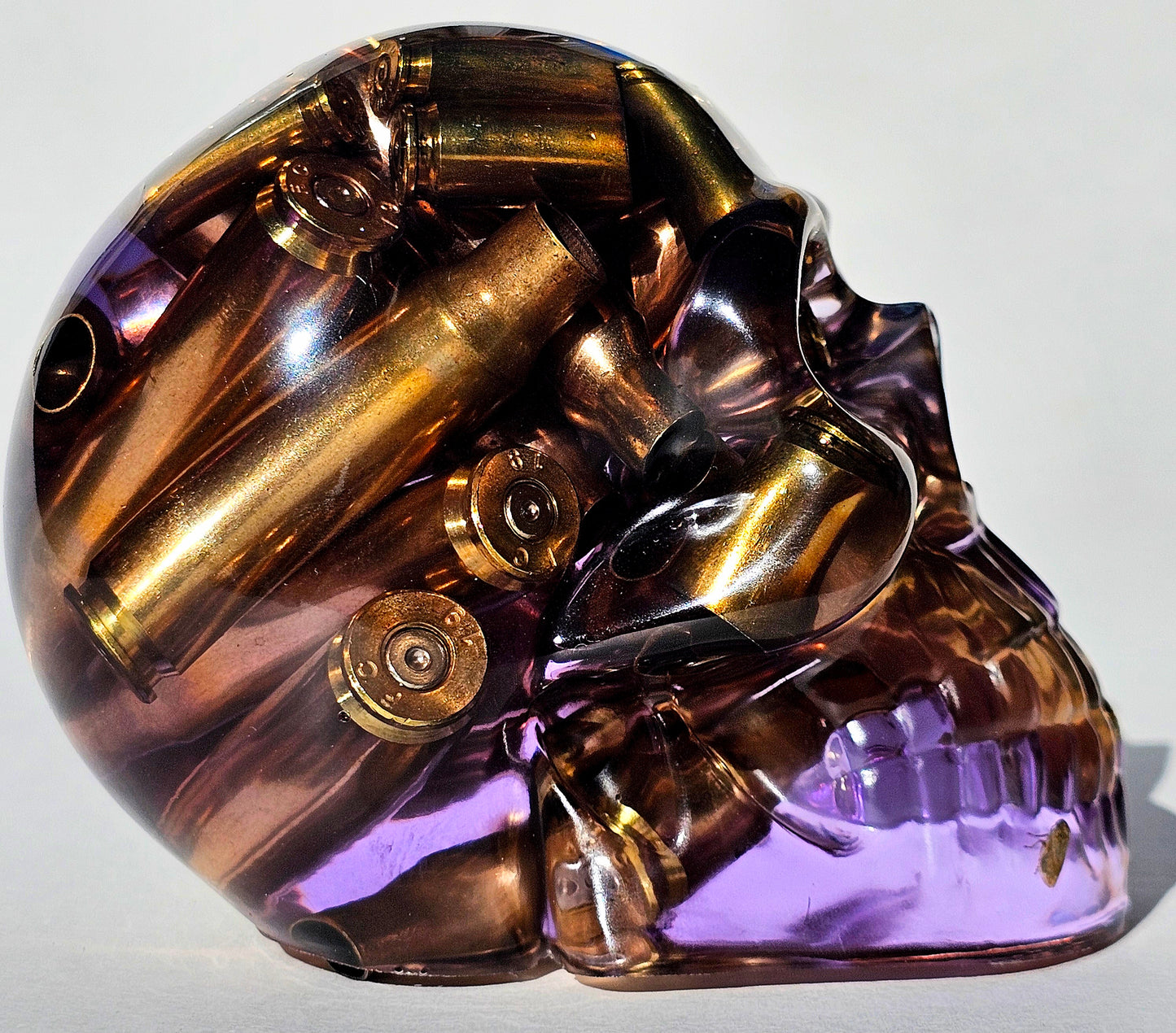 #0284 - Handmade Resin Skull - Mixed large calibre brass, in a light purple resin.