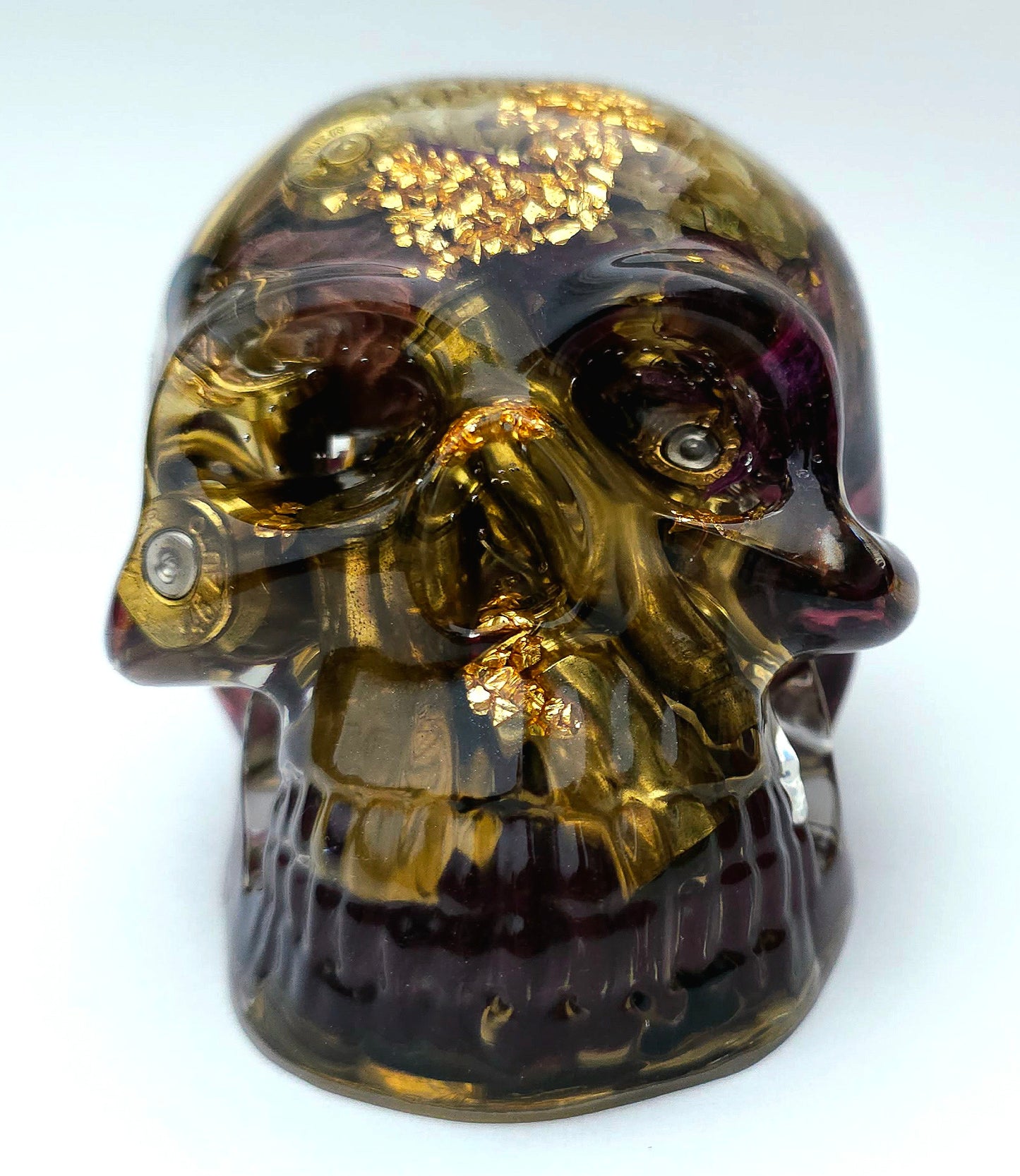 *SOLD*Handmade Resin Skull - With dried wild Rose and flowers. We've also added spent brass shells to help ground the piece and give it different twist.