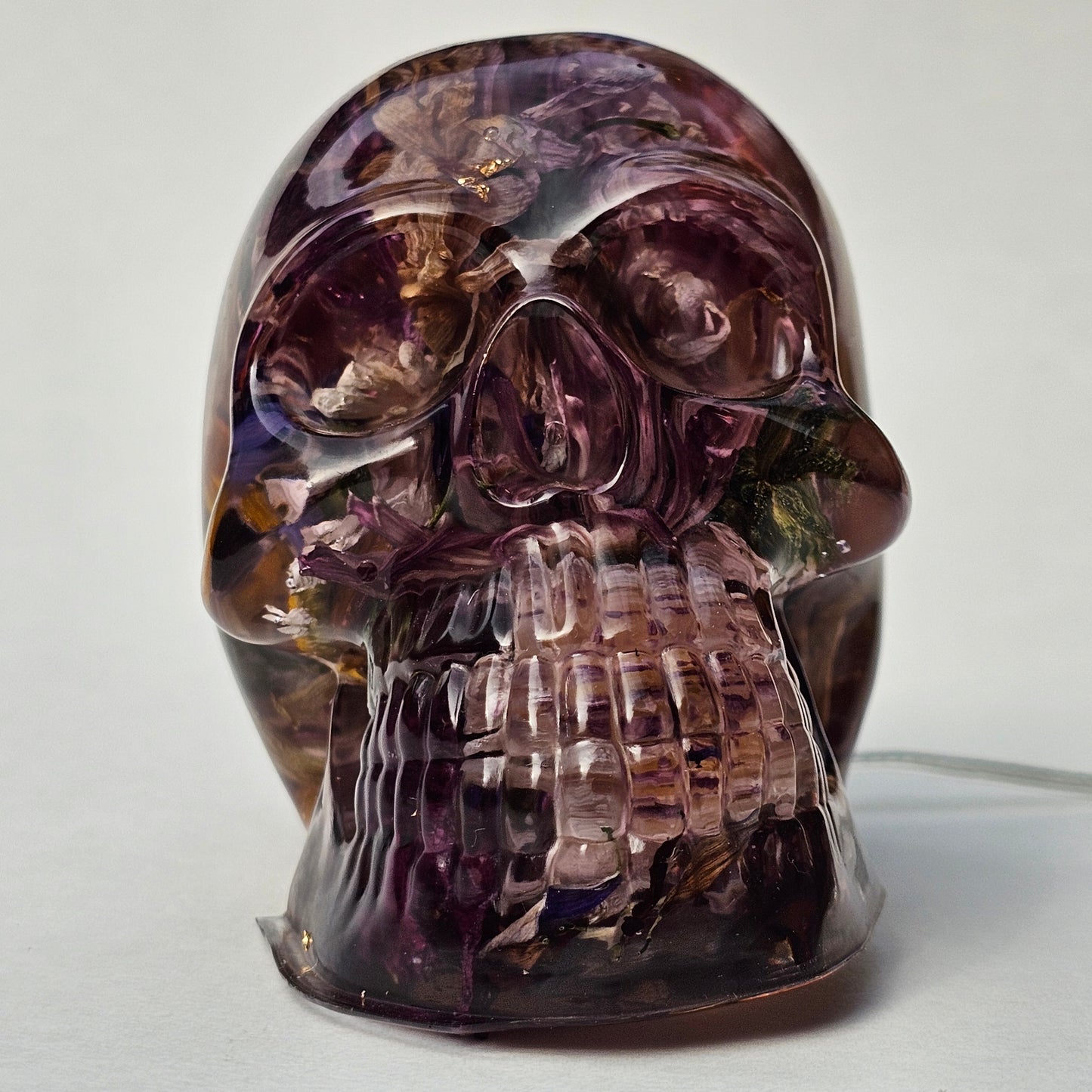 #0294 - Handmade Resin Skull - Autumn flower blend in light purple resin. This one lights up! HAS LIGHTS!