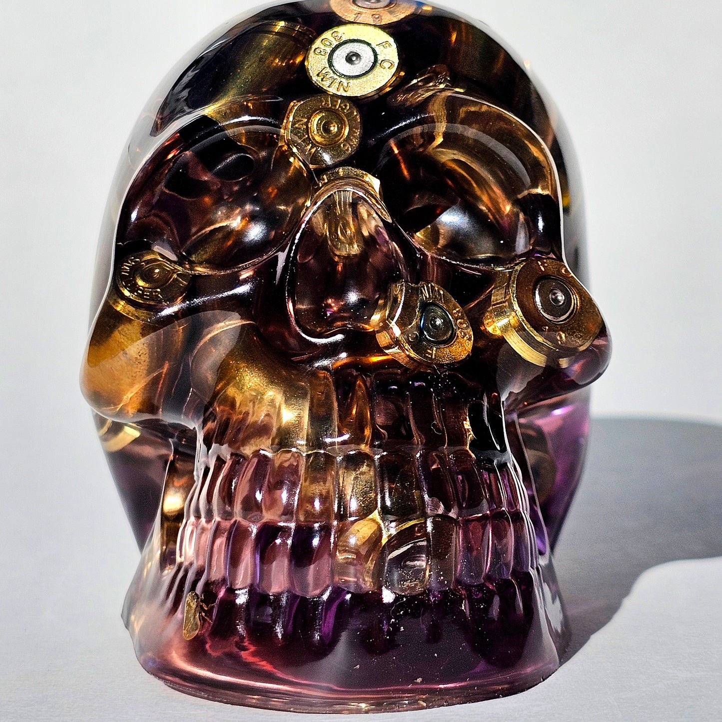 #0284 - Handmade Resin Skull - Mixed large calibre brass, in a light purple resin.