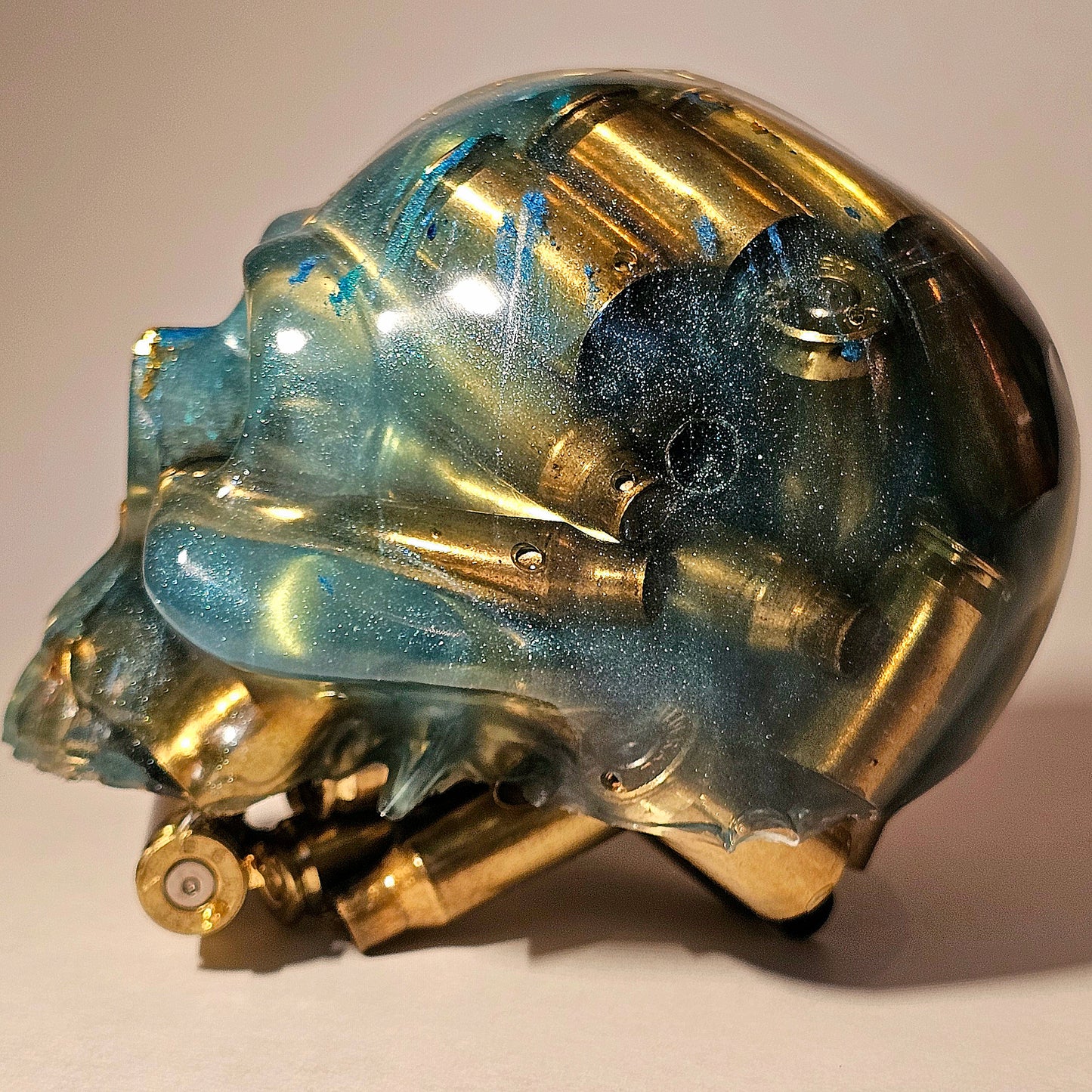 #0259 Handmade Resin Skull - Mixed brass in silver pigmen/blue resin. One of a kind for sure.