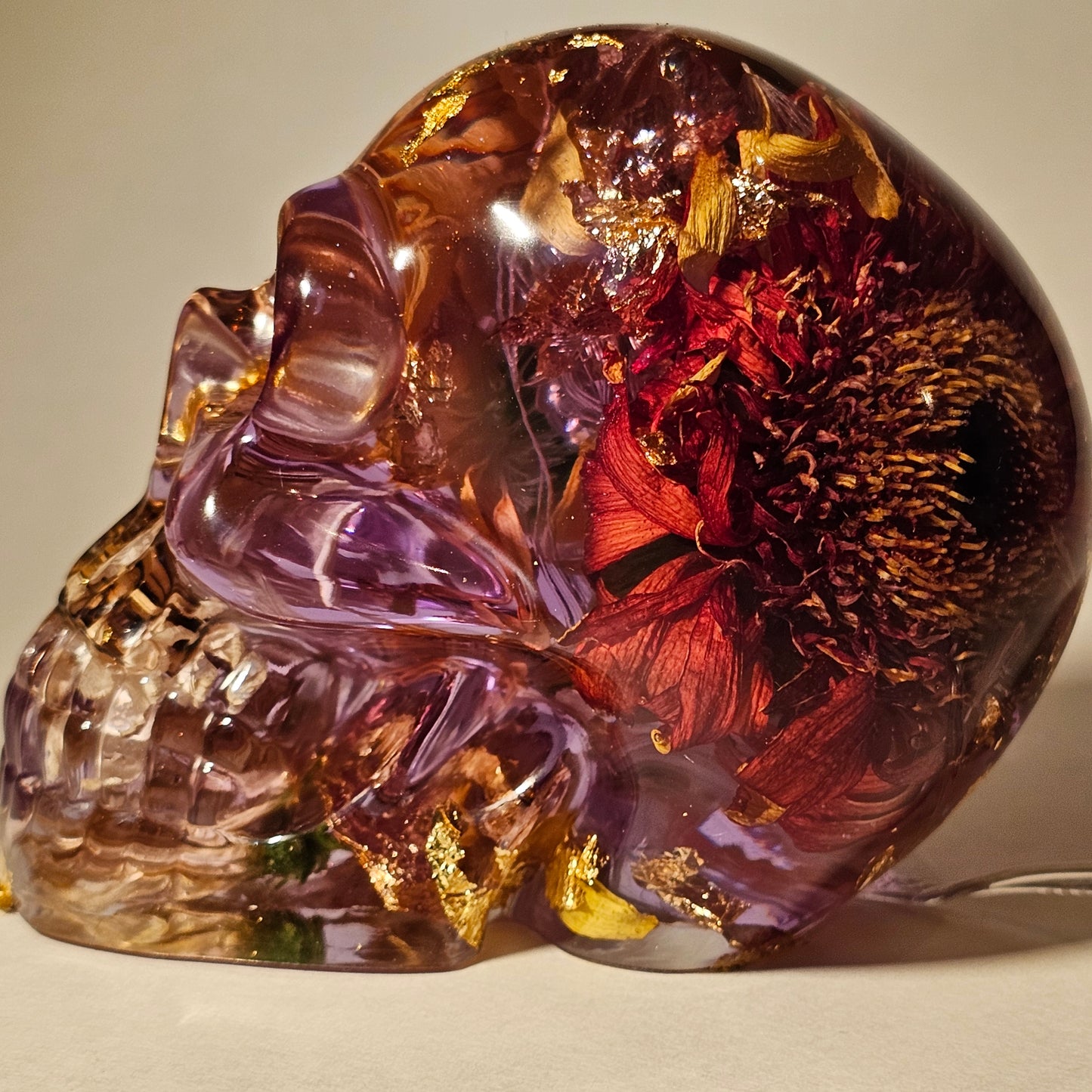 #0269 Handmade Resin Skull - Mixed flowers in clear resin. HAS LIGHTS. Battery operated.