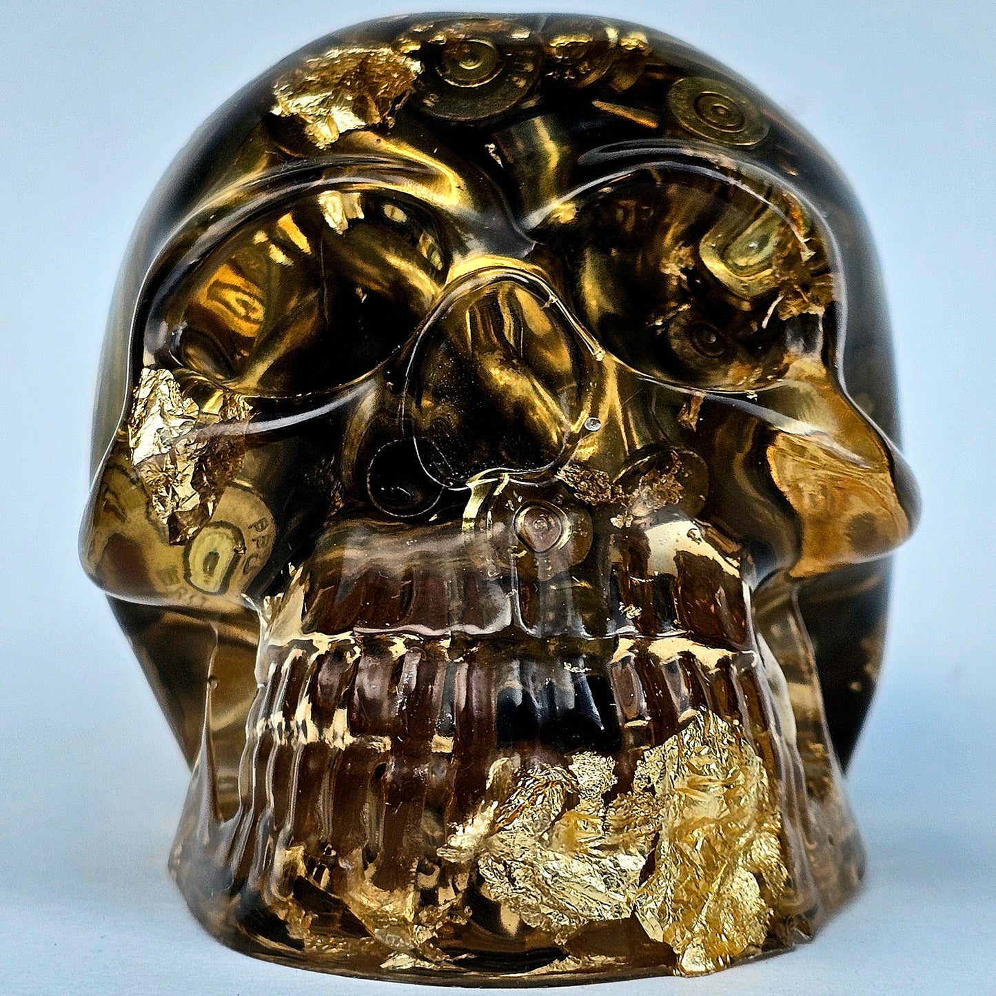 #0279 Handmade Resin Skull - Brass in clear resin with gold accents