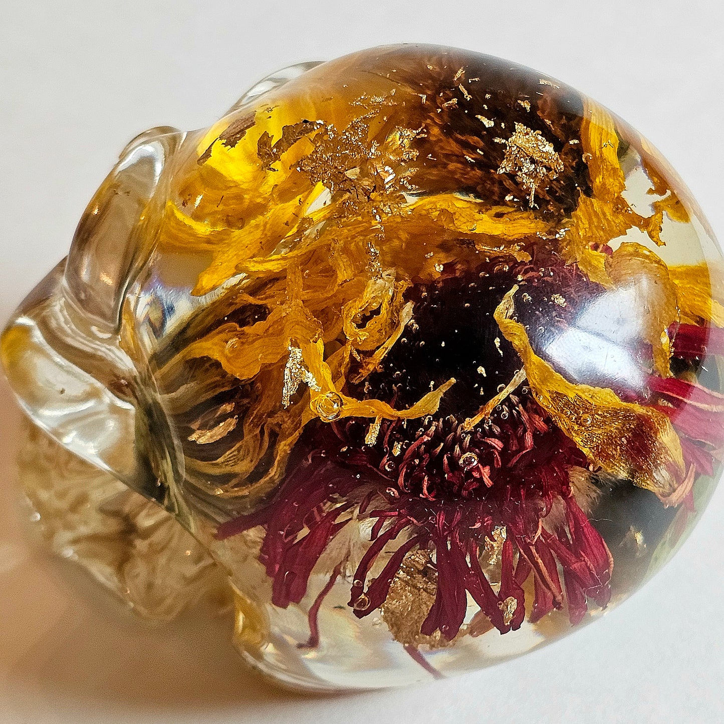 #0000 - Handmade Resin Skull - Mixed flowers in clear resin. Nice detail here.