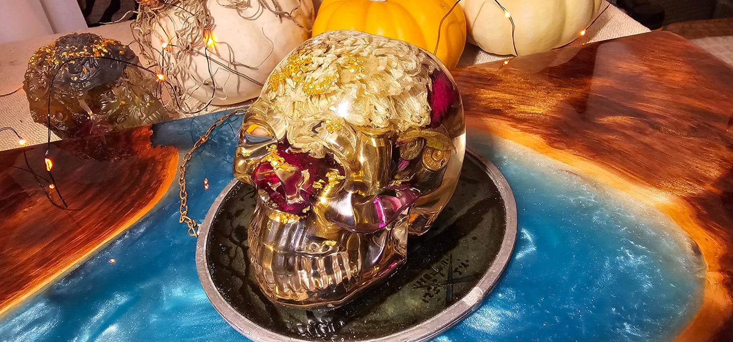 *SOLD*Handmade Resin Skull - With dried wild Rose and flowers. We've also added spent brass shells to help ground the piece and give it different twist.