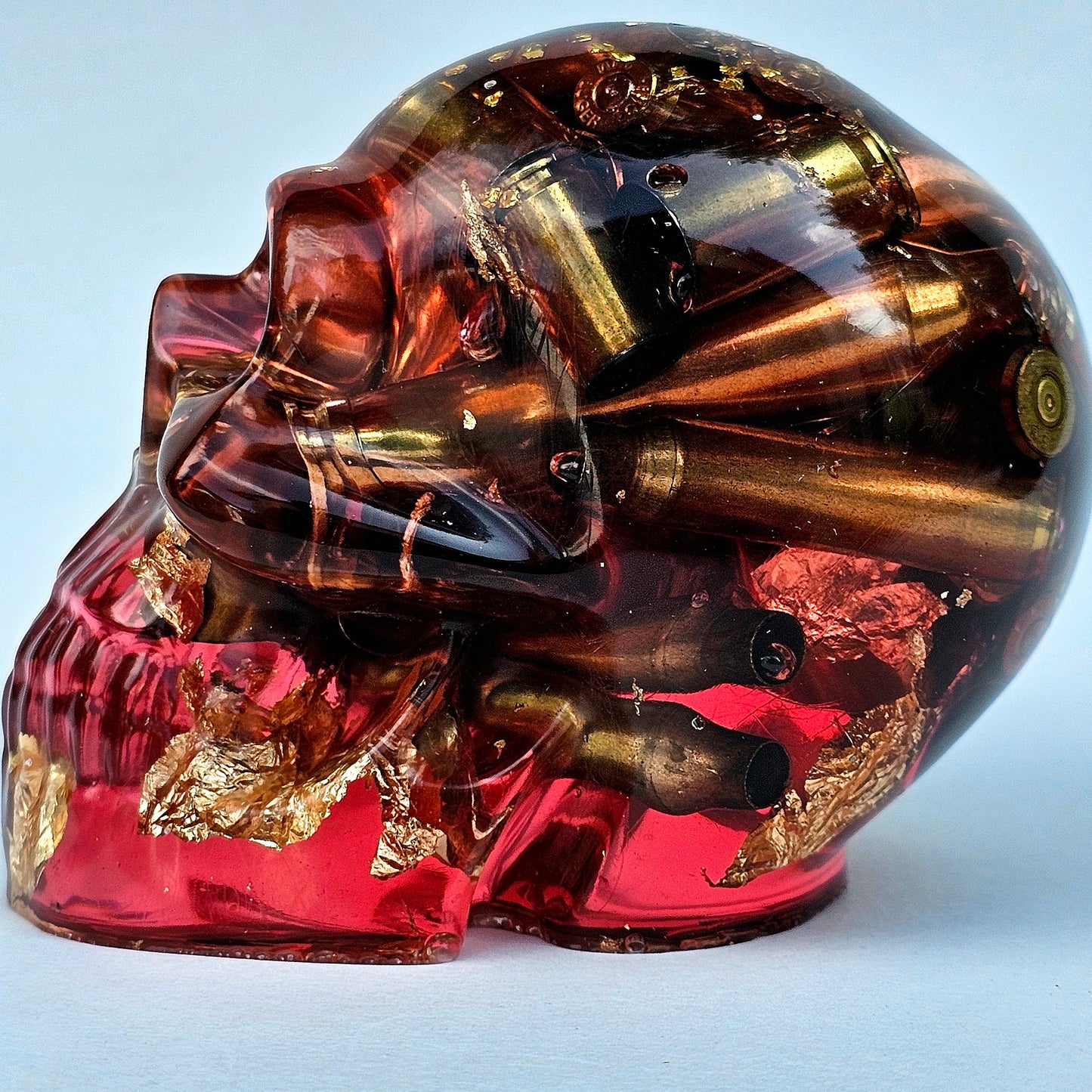 #0278 Handmade Resin Skull - Brass in red resin with gold accents