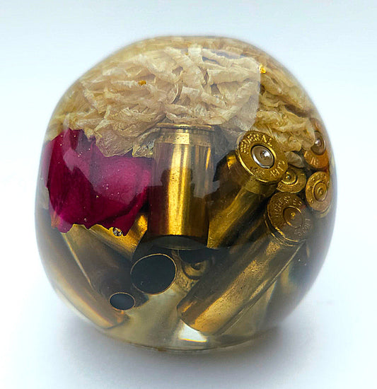 SOLD*Handmade Resin Skull- With wild dried Hydrangea flower mixture.  We've also added spent brass shells to help ground the piece some contrast.