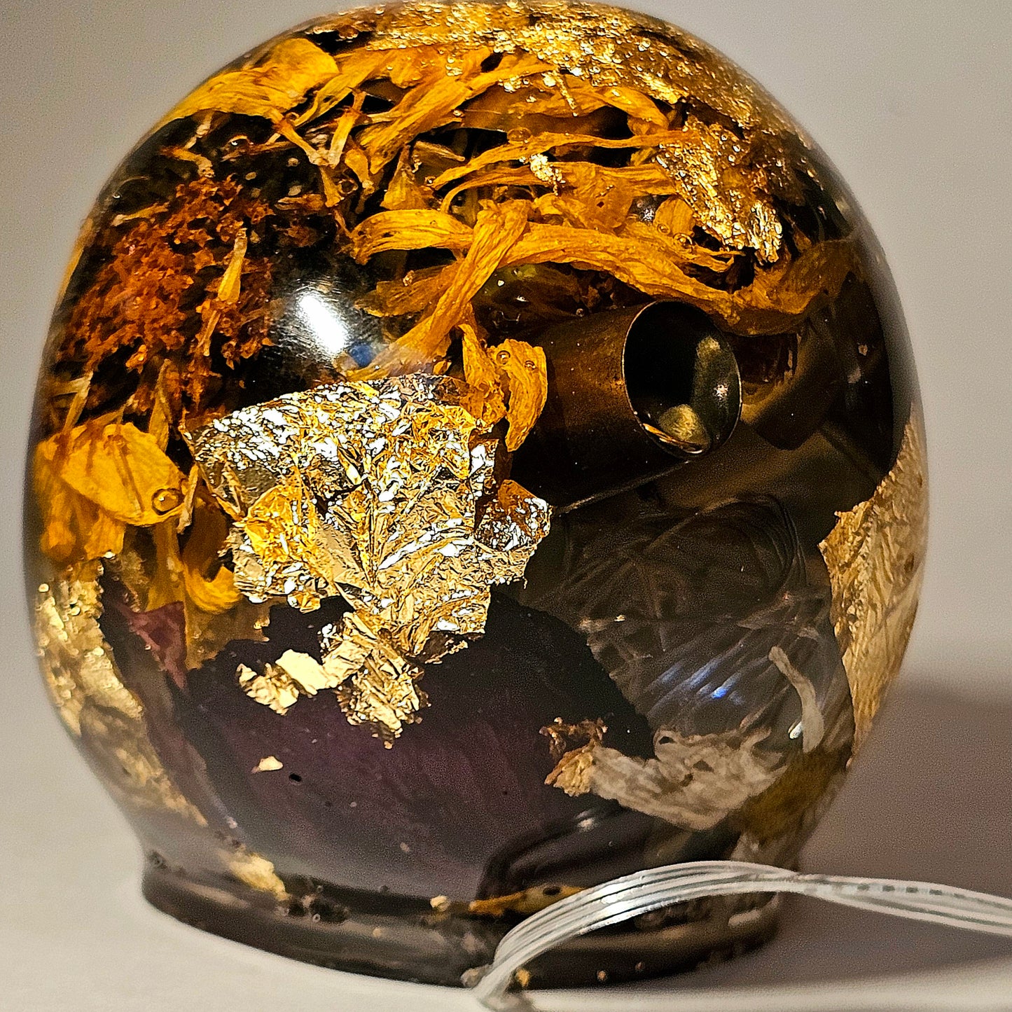 #0268 Handmade Resin Skull - Mixed flowers and brass in clear resin. HAS LIGHTS. Battery operated.