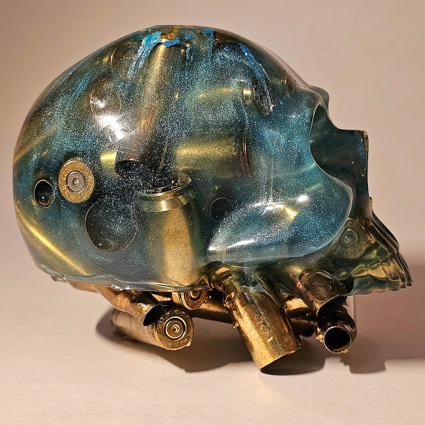 #0259 Handmade Resin Skull - Mixed brass in silver pigmen/blue resin. One of a kind for sure.