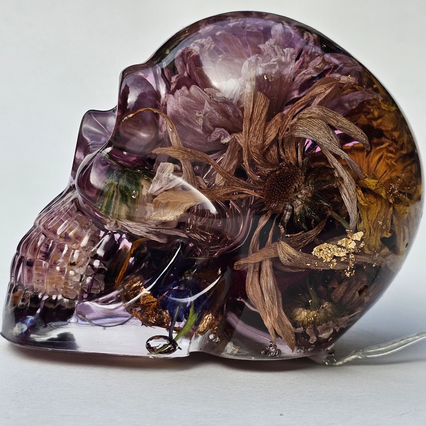 #0294 - Handmade Resin Skull - Autumn flower blend in light purple resin. This one lights up! HAS LIGHTS!