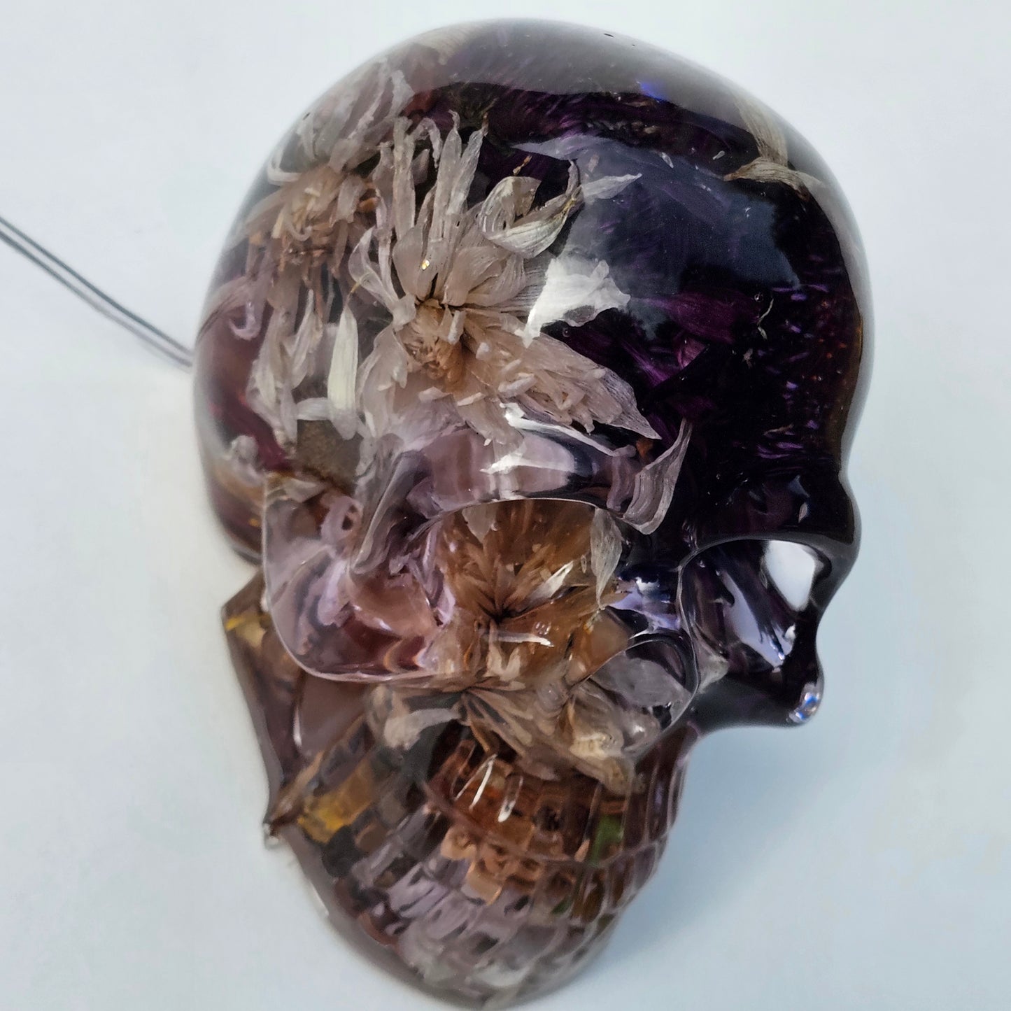 #0293- Handmade Resin Skull - Autumn flower blend in light purple resin. This one lights up! HAS LIGHTS!