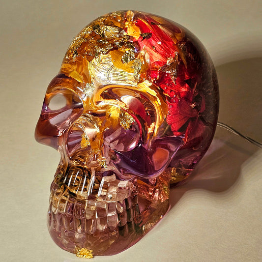 #0269 Handmade Resin Skull - Mixed flowers in clear resin. HAS LIGHTS. Battery operated.