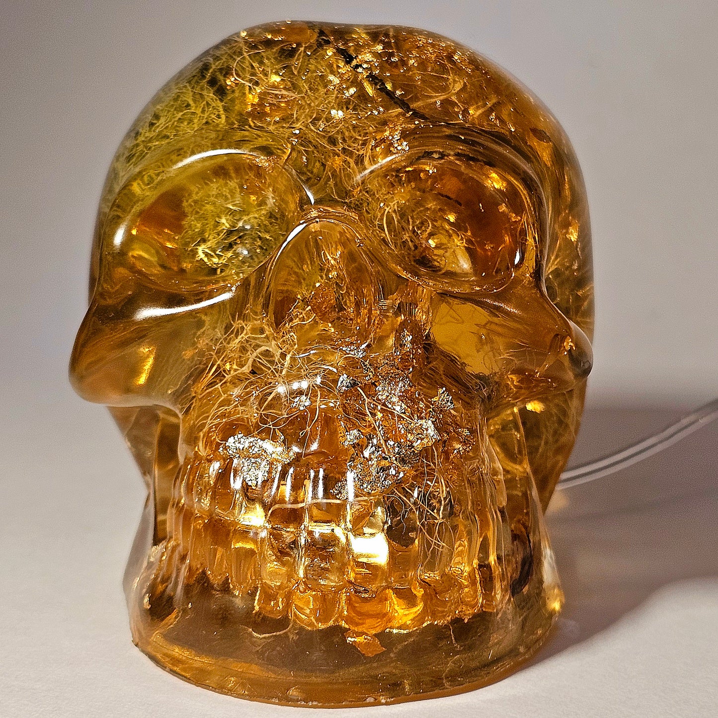 #0267 Handmade Resin Skull - Mixed tree lichen (Old mans beard) in clear resin, fun piece. HAS LIGHTS. Battery operated.