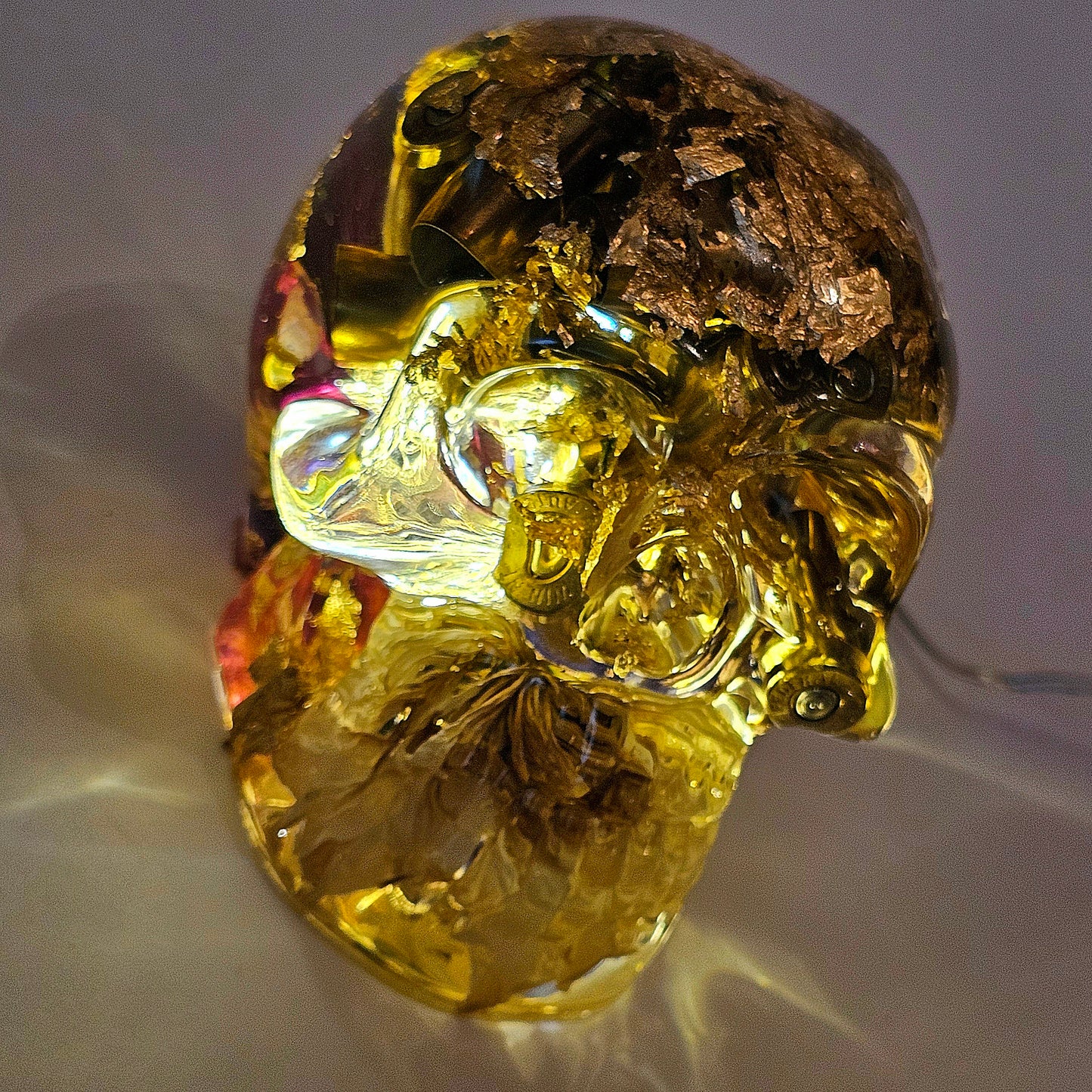 #0268 Handmade Resin Skull - Mixed flowers and brass in clear resin. HAS LIGHTS. Battery operated.