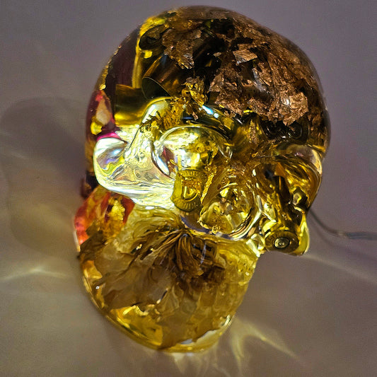 #0268 Handmade Resin Skull - Mixed flowers and brass in clear resin. HAS LIGHTS. Battery operated.