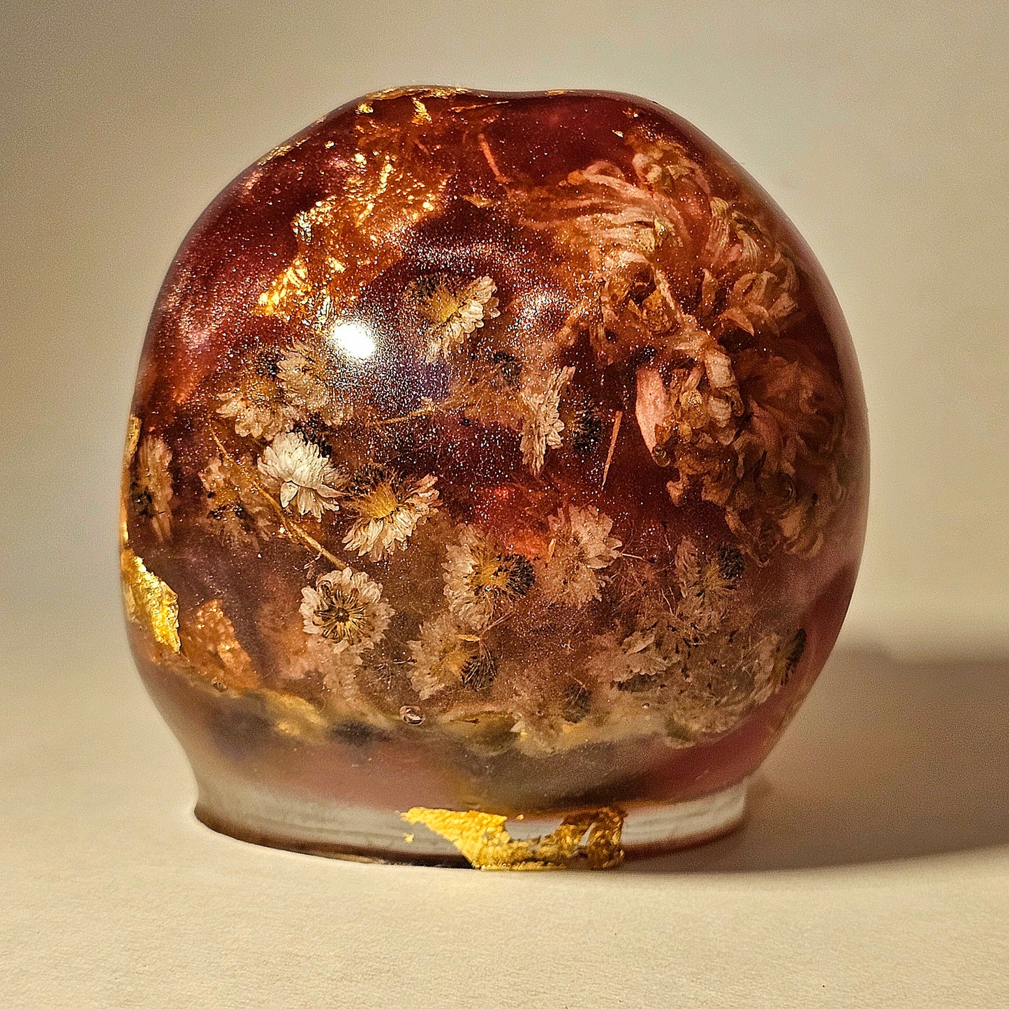 #0260 Handmade Resin Skull - Mixed flowers in warm light red resin.