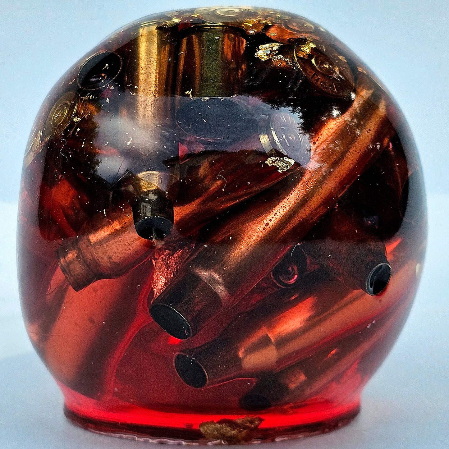 #0276 Handmade Resin Skull - Brass in red resin with gold accents