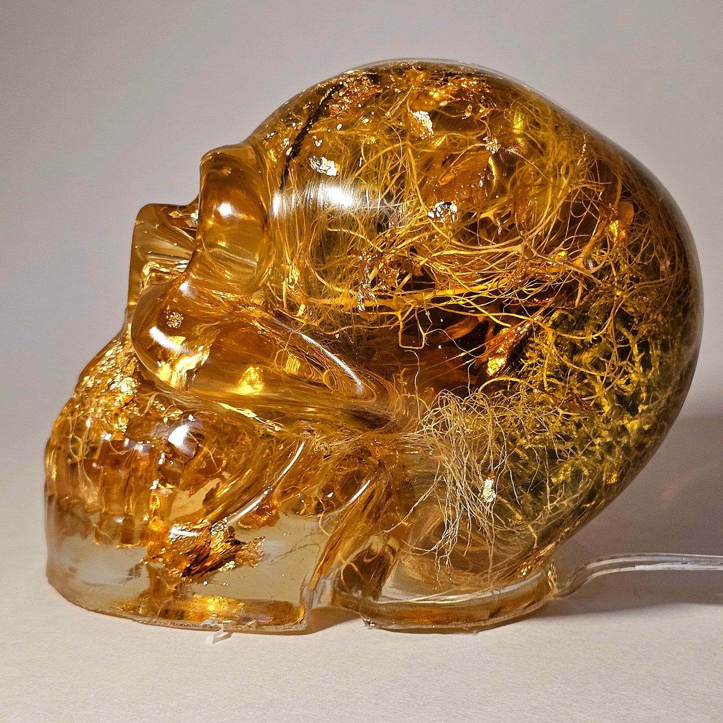 #0267 Handmade Resin Skull - Mixed tree lichen (Old mans beard) in clear resin, fun piece. HAS LIGHTS. Battery operated.