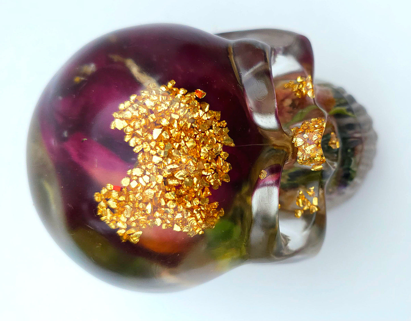 *SOLD*Handmade Resin Skull- Large wild Rose, with flower mixture. Discounted price. This piece came out quite cloudy.
